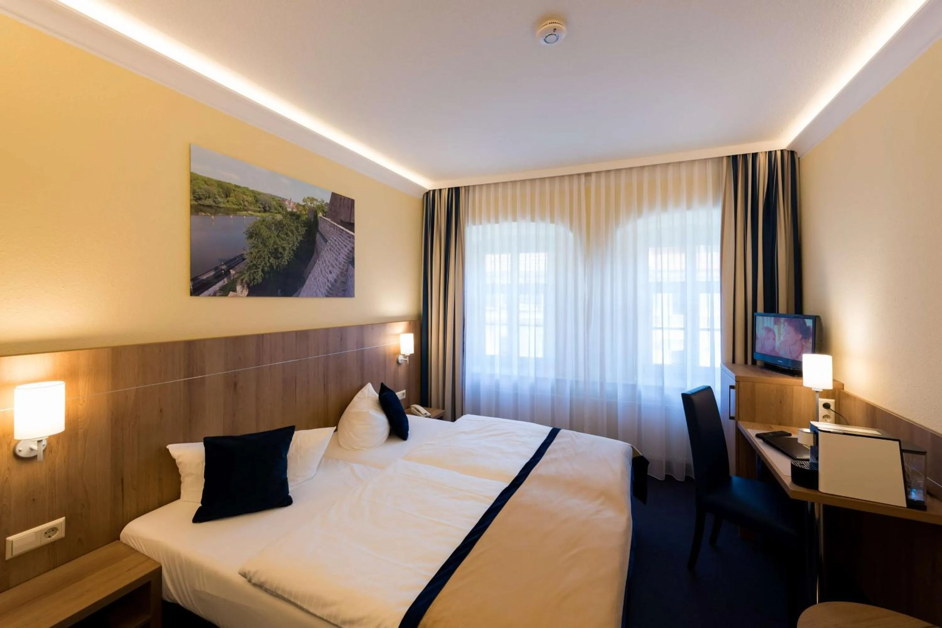 Photo of the whole room, Bed in Askania Hotel & Brauhaus