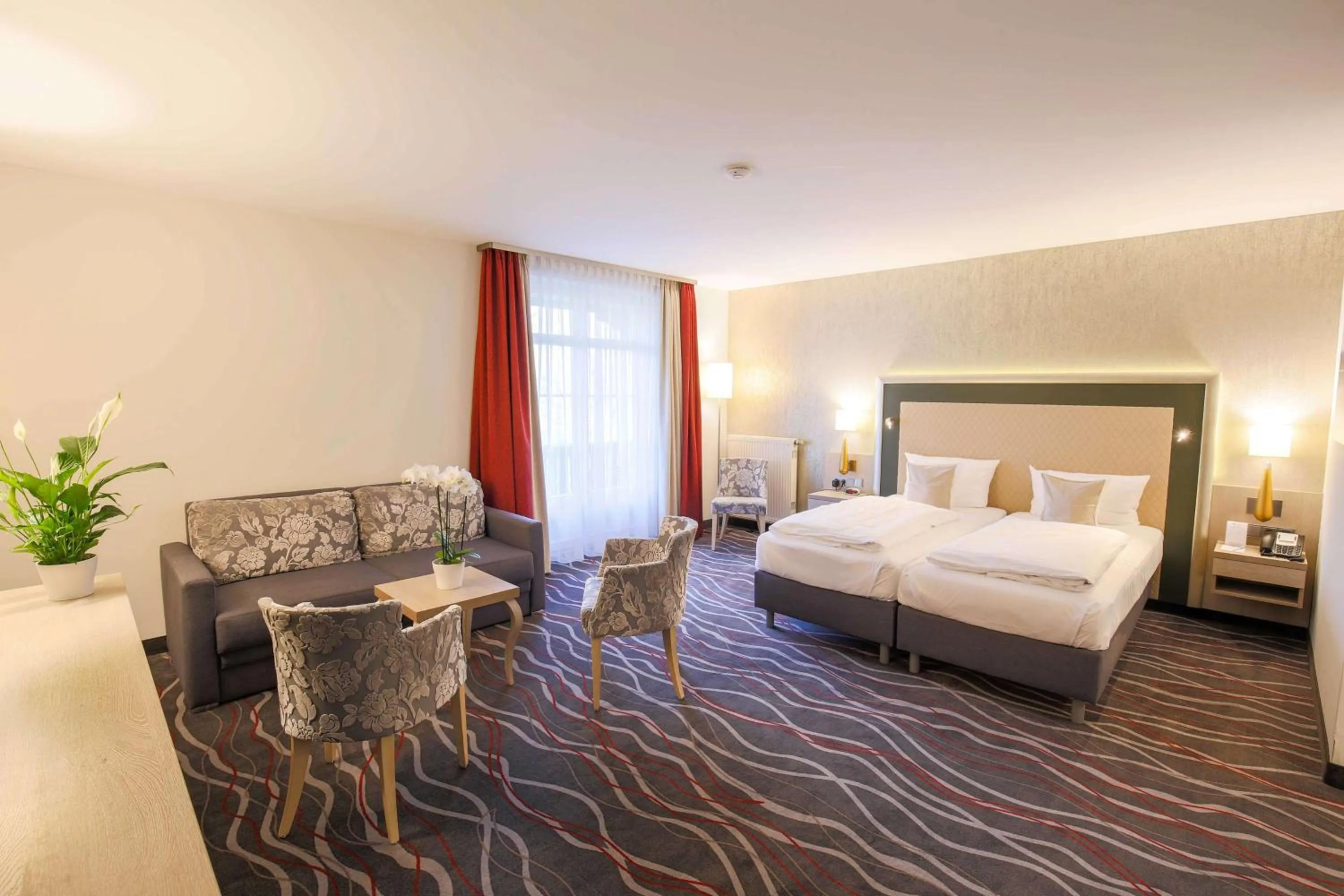 Photo of the whole room, Bed in Hotel Bayerischer Hof Miesbach, BW Premier Collection