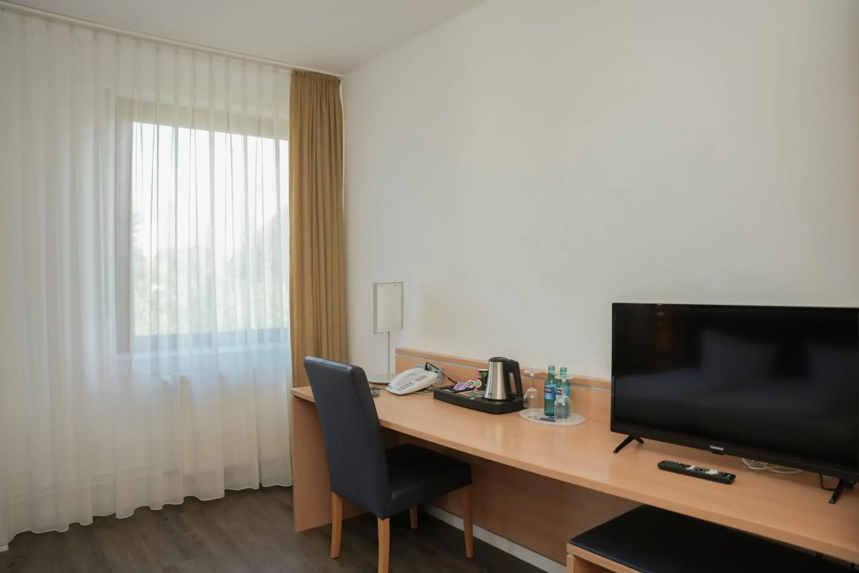 Economy Single Room in Hotel Offenbacher Hof Economy Single Room in Hotel Offenbacher Hof