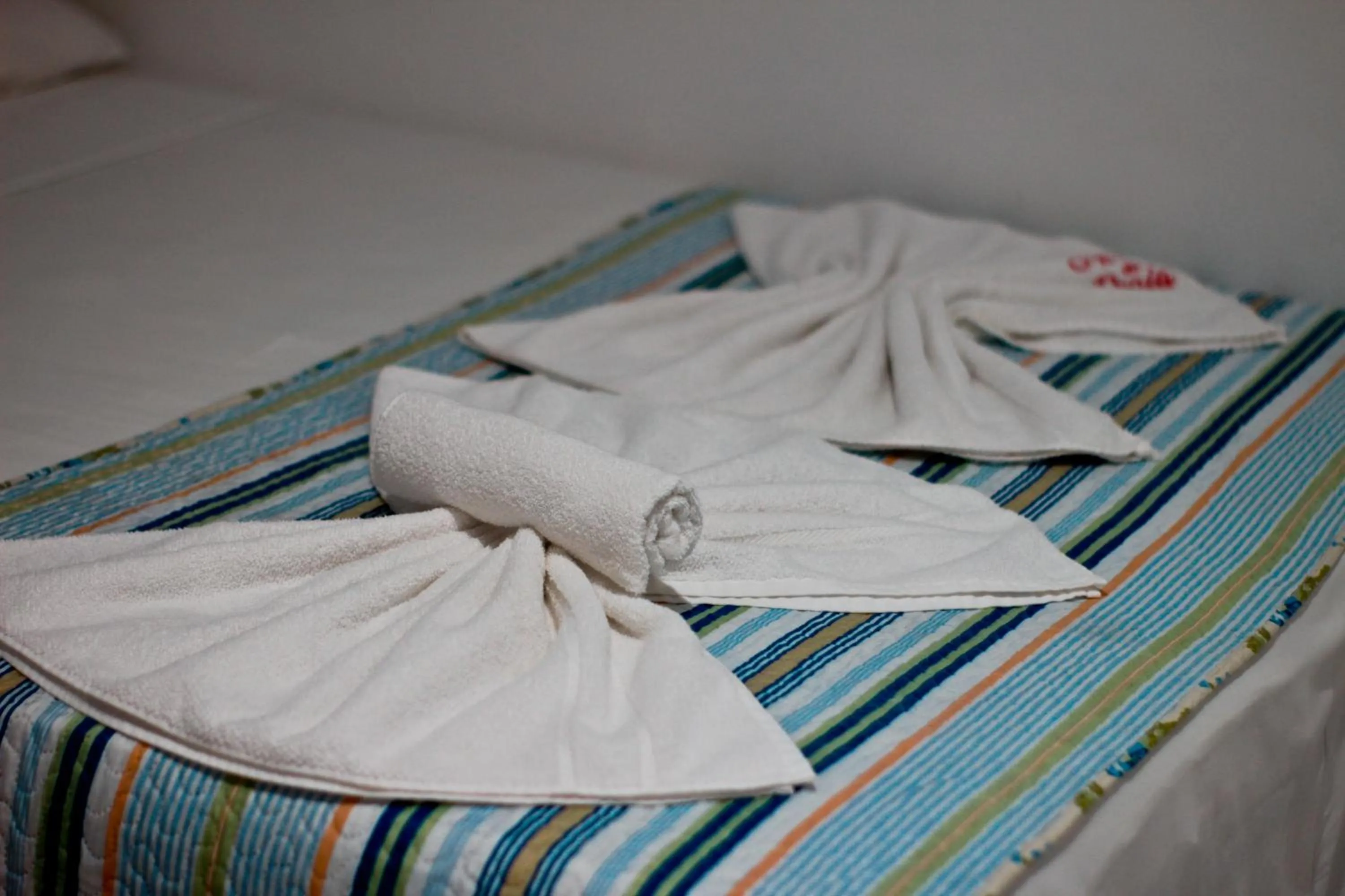 towels, Bed in Pousada Solar da Praia