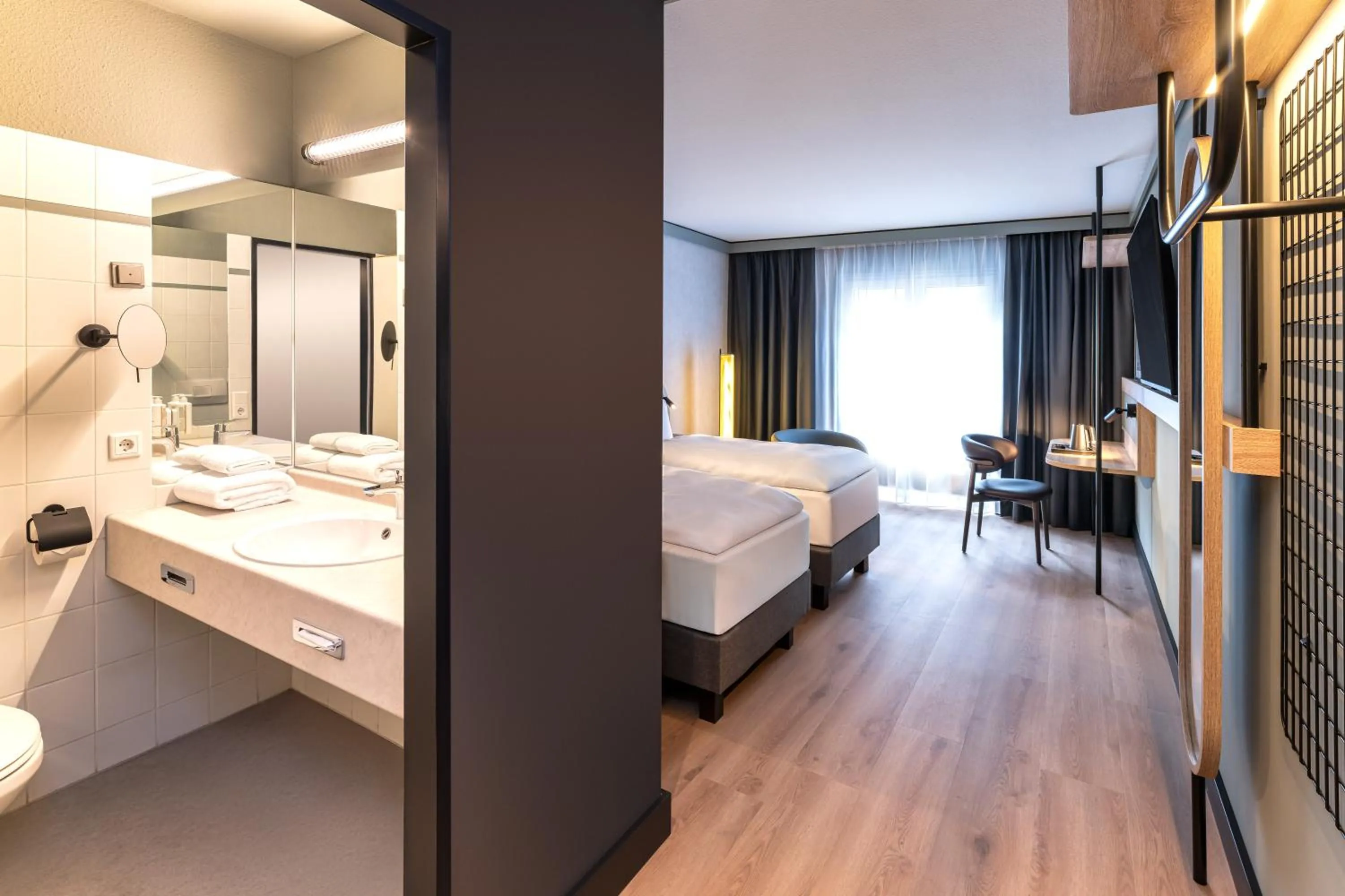 Photo of the whole room, Bed in Radisson Hotel Dusseldorf City Center