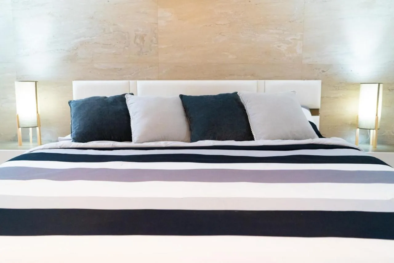 Bed in ECONOSUITES FUNDIDORA