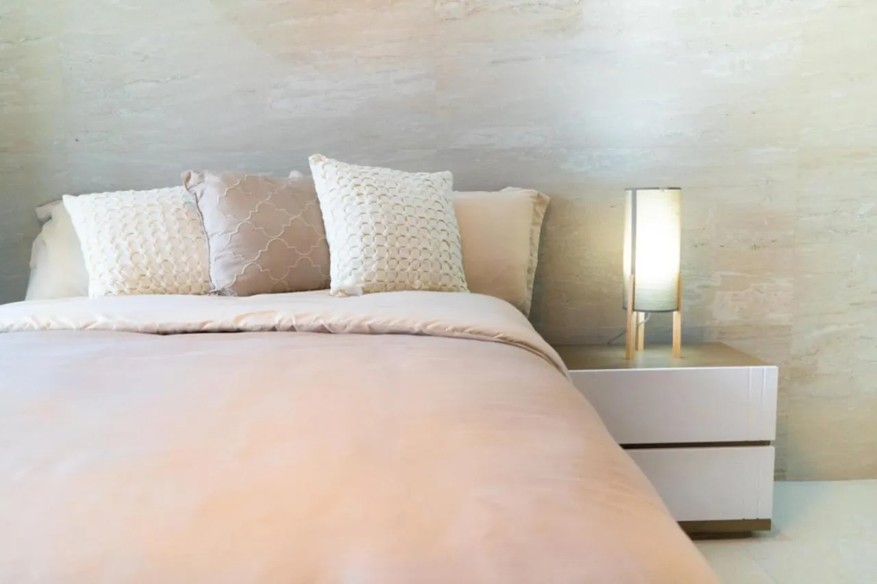 Bed in ECONOSUITES FUNDIDORA