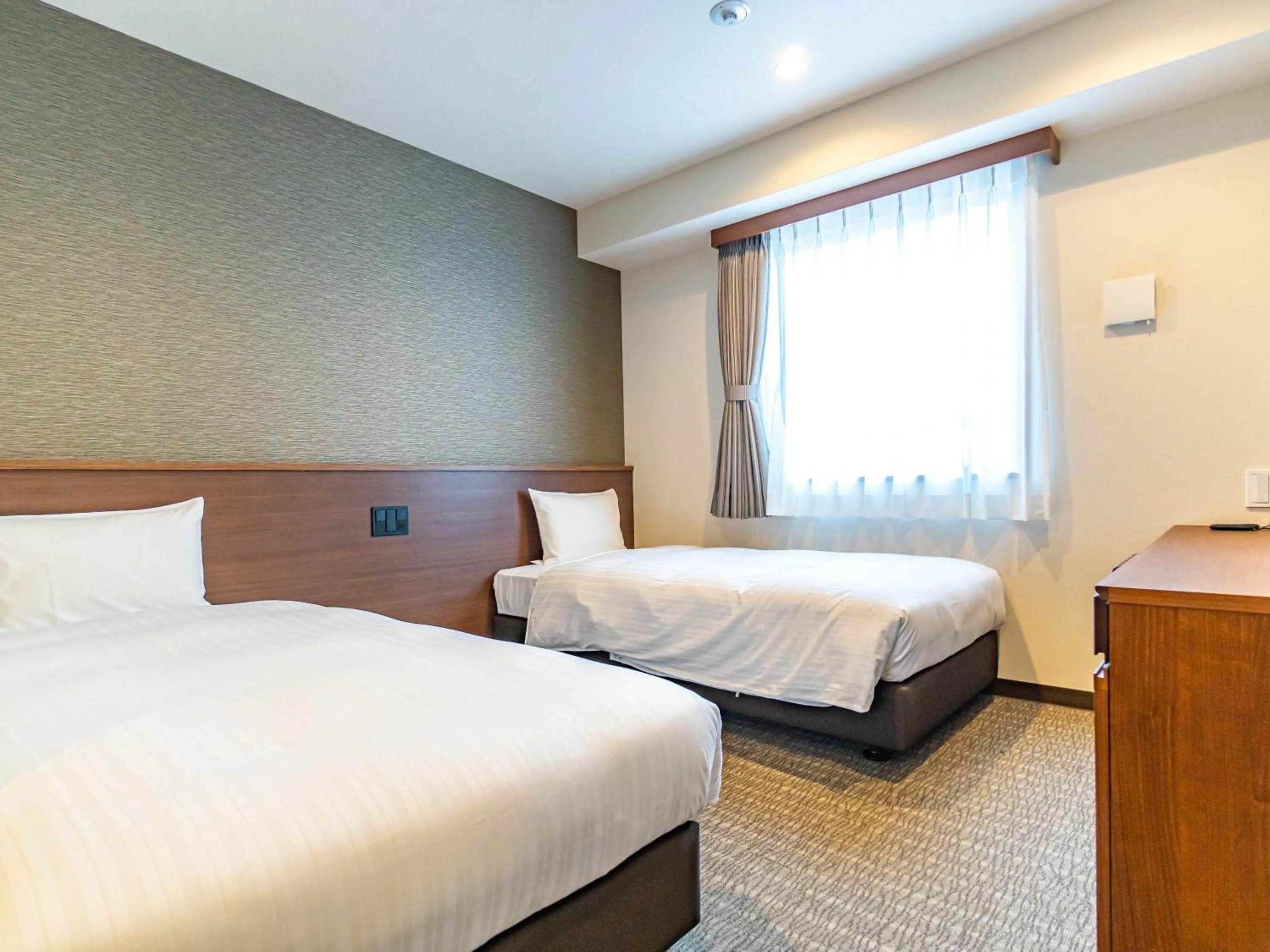 Bed in Bande Hotel Tenpozan Higashi