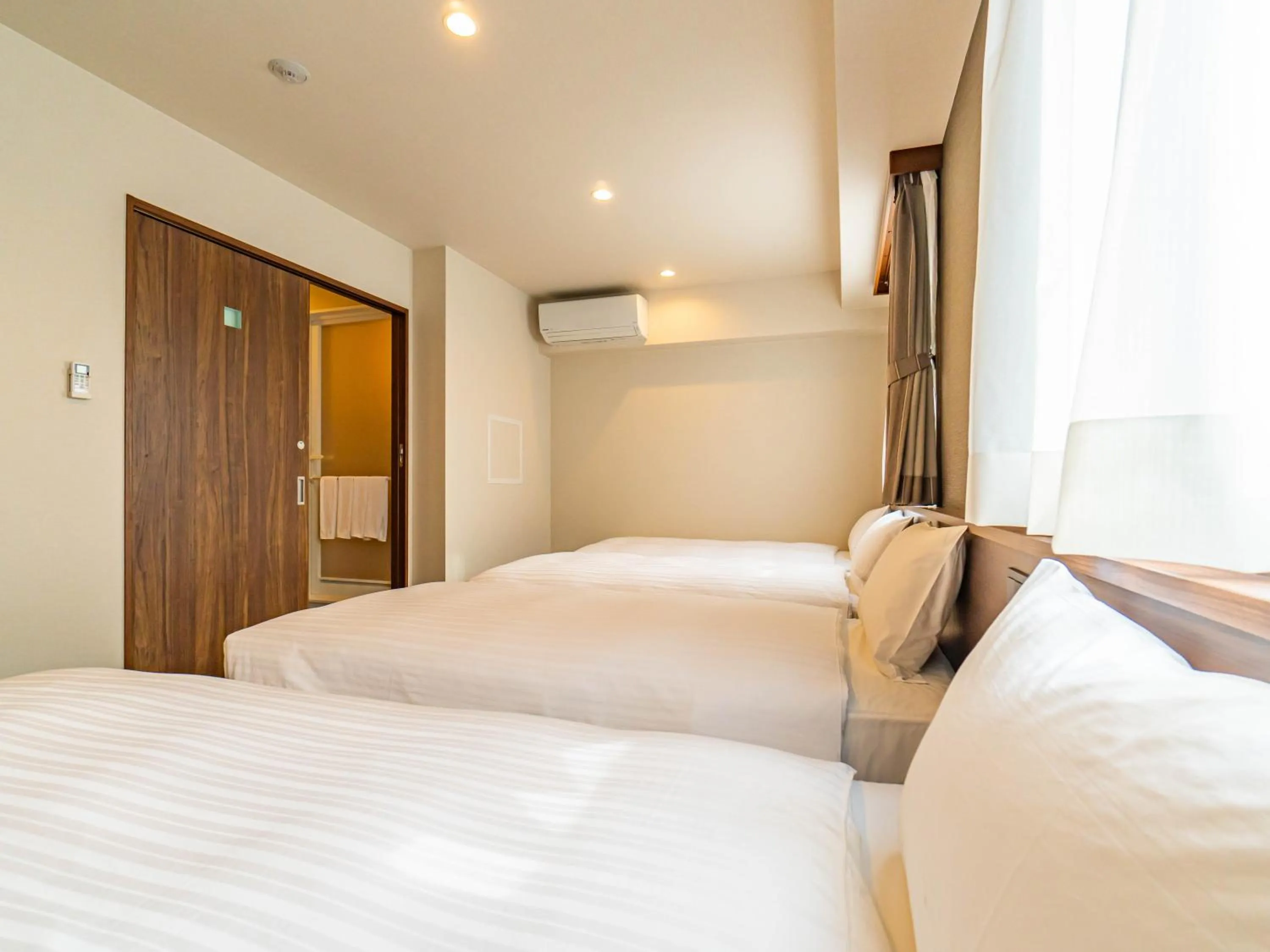 Bed in Bande Hotel Tenpozan Higashi