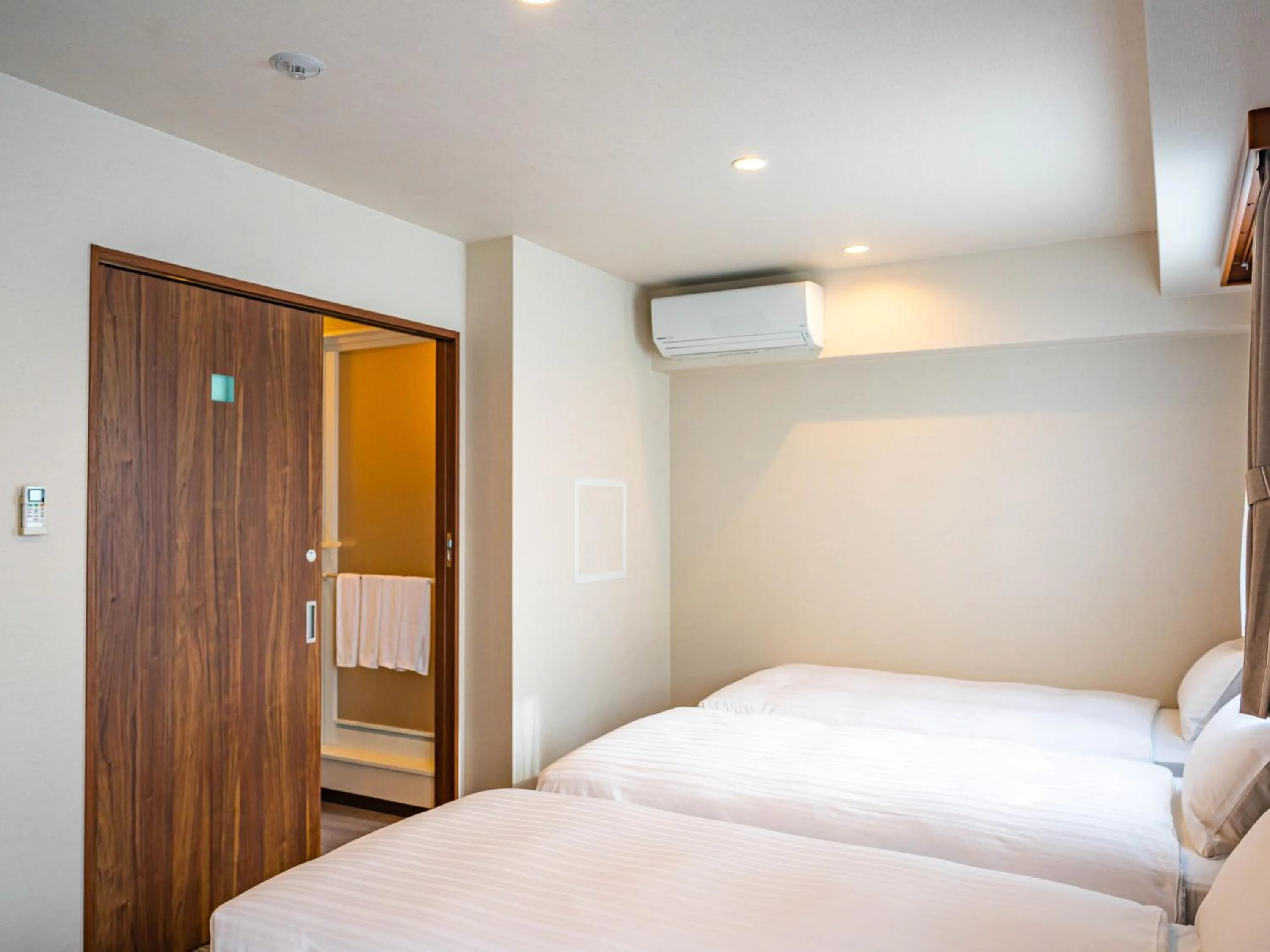 Bed in Bande Hotel Tenpozan Higashi