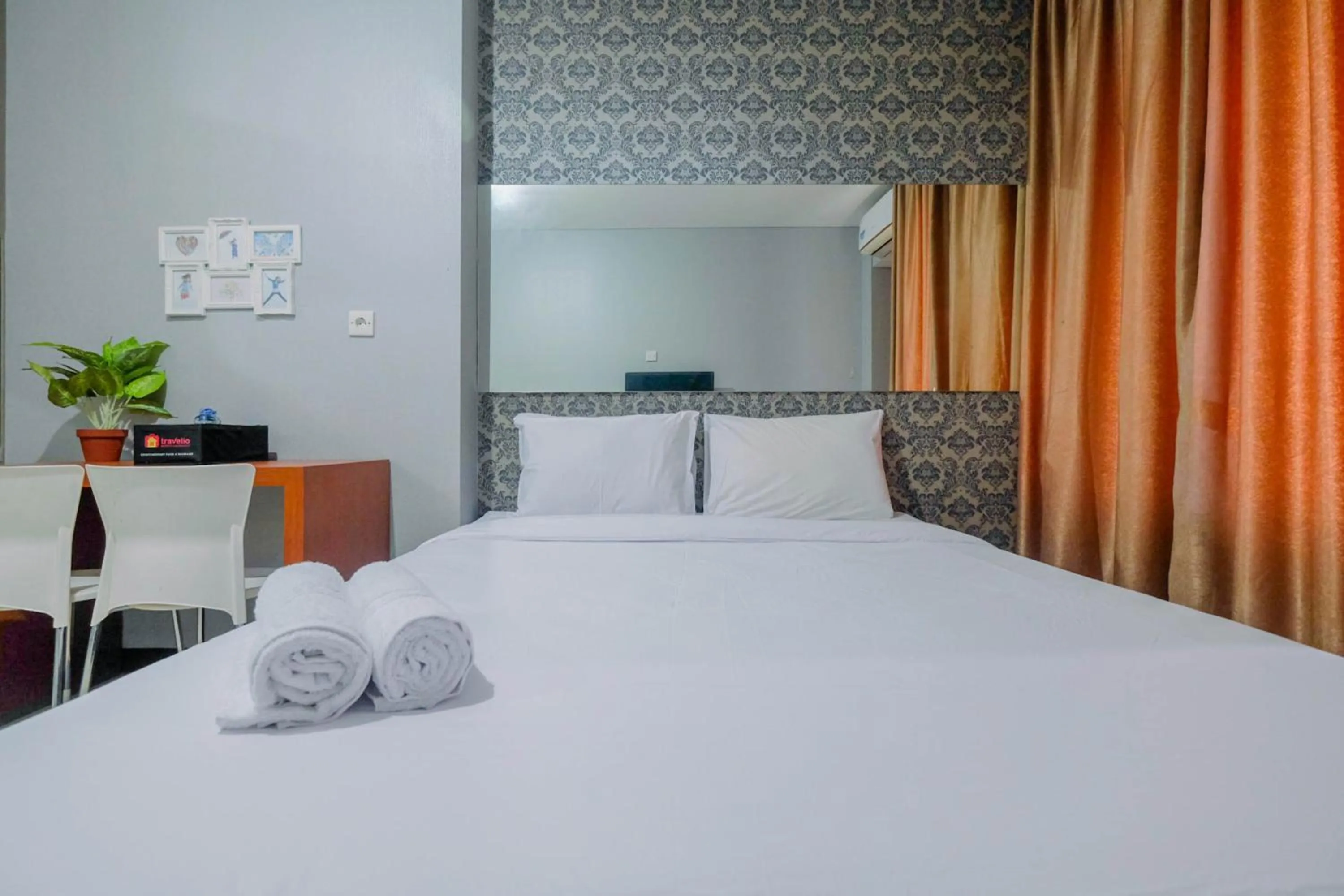 Bed in Vintage Studio Apartment at Nifarro Park By Travelio