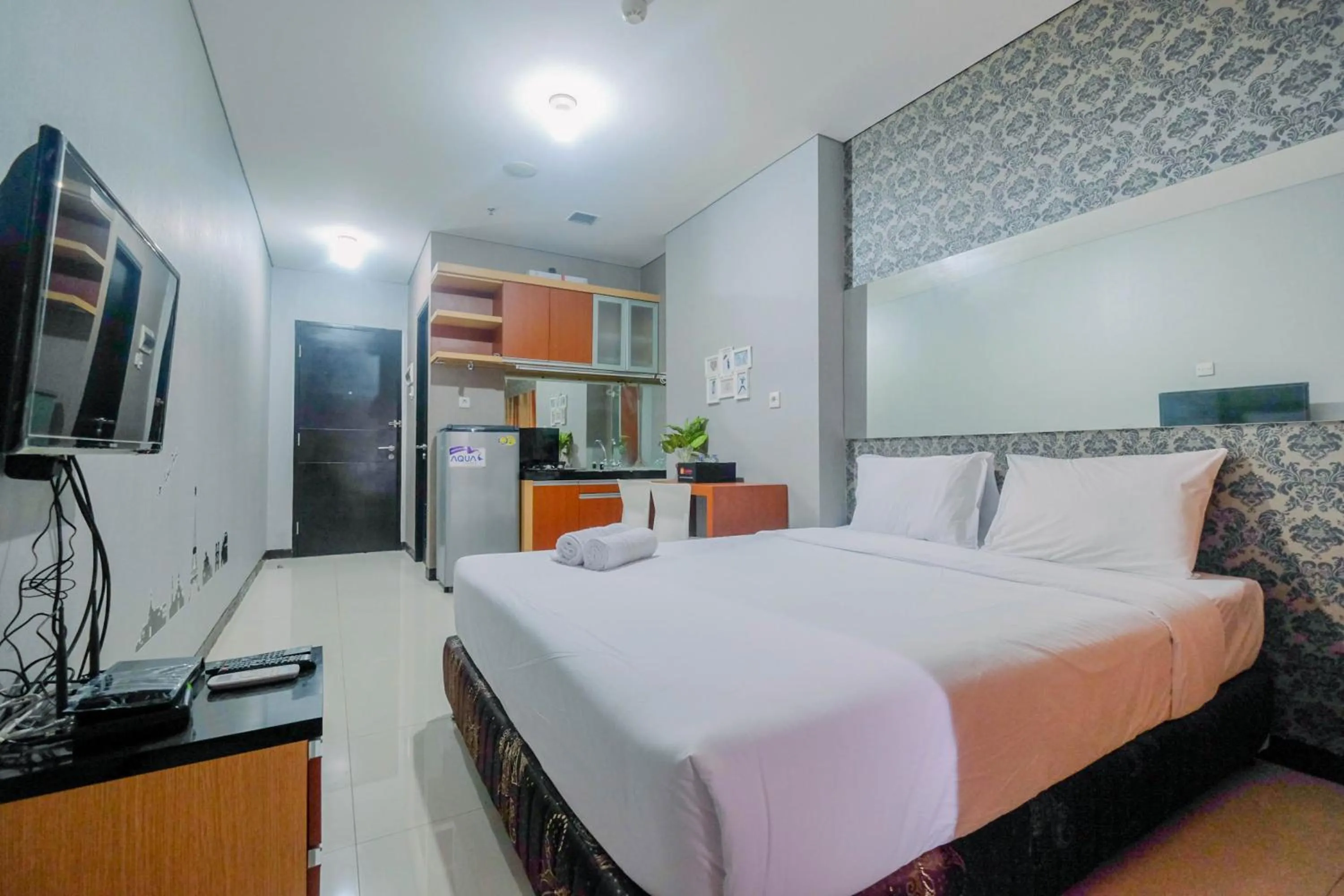 Bed in Vintage Studio Apartment at Nifarro Park By Travelio