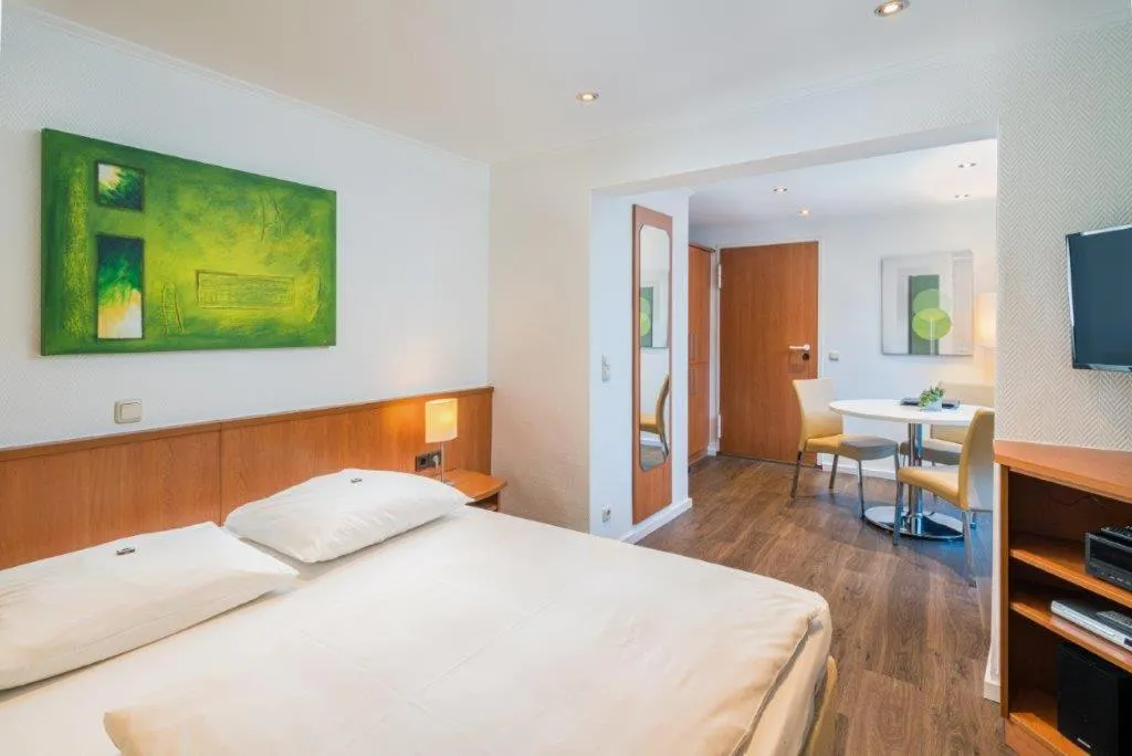 Photo of the whole room, Bed in Hotel Am Nockherberg