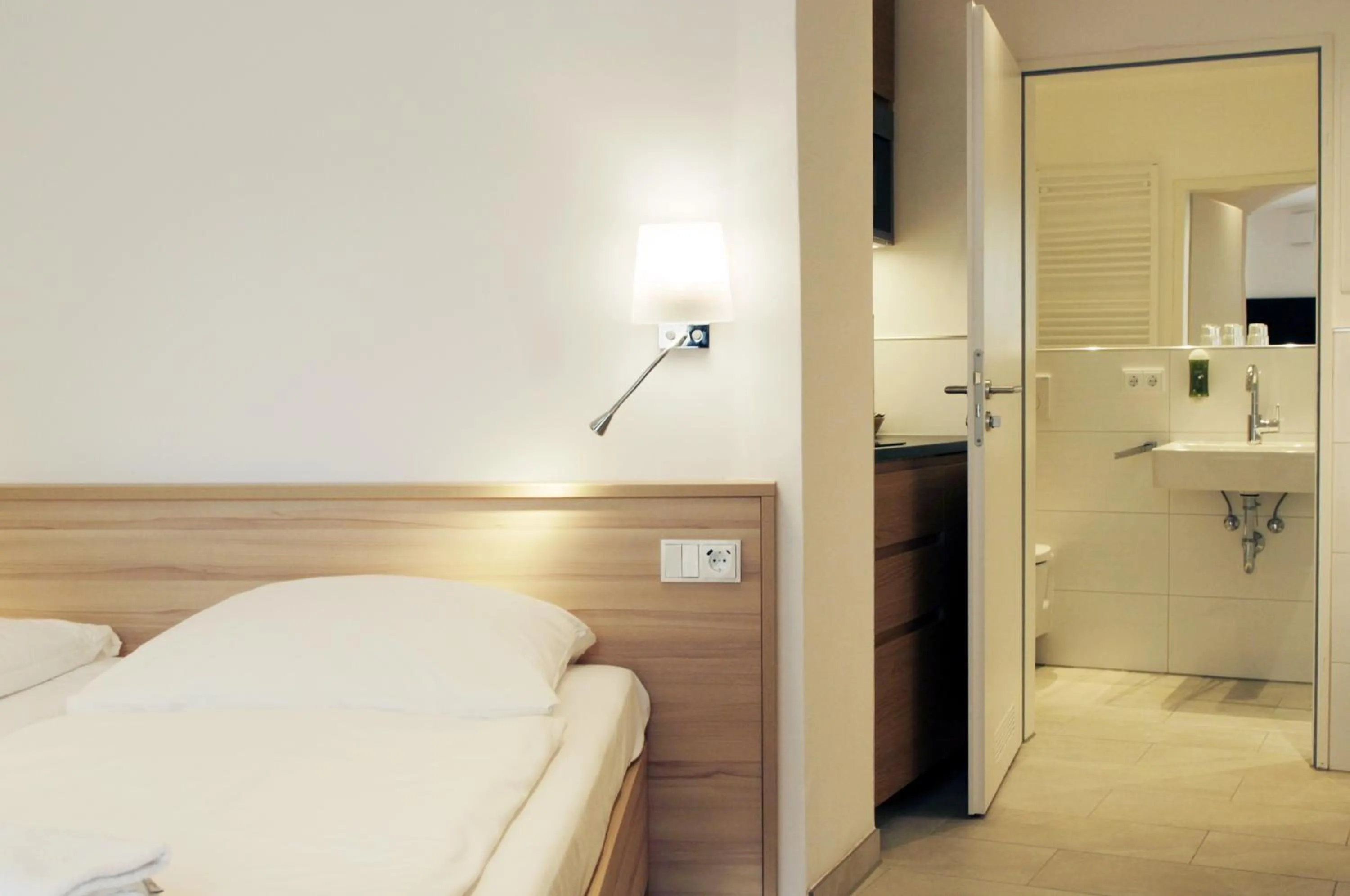 Photo of the whole room, Bed in Hotel ADRIA München