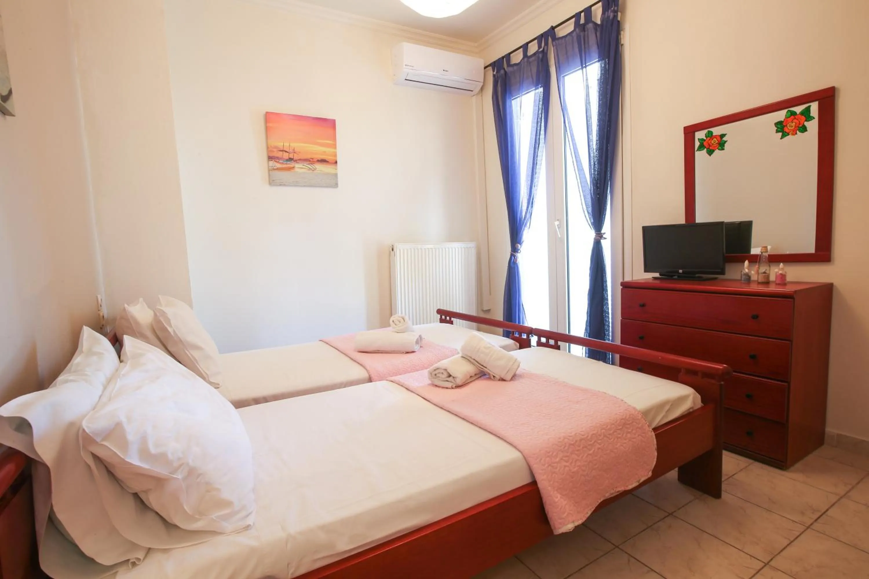 Bed in S&C Kosmos Beach Resort