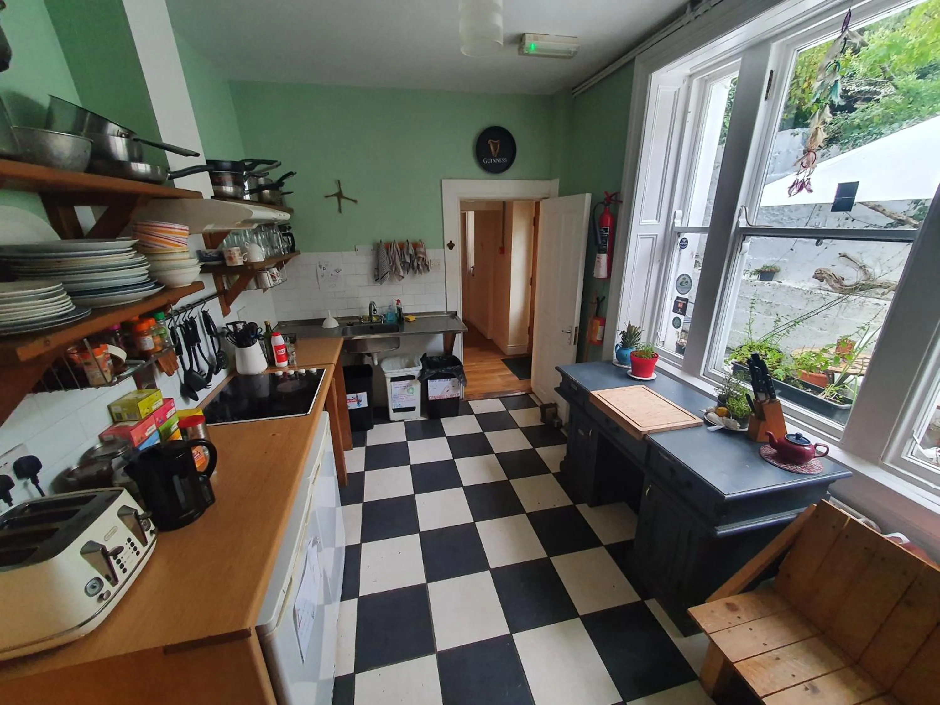 Communal kitchen in The Grapevine Hostel