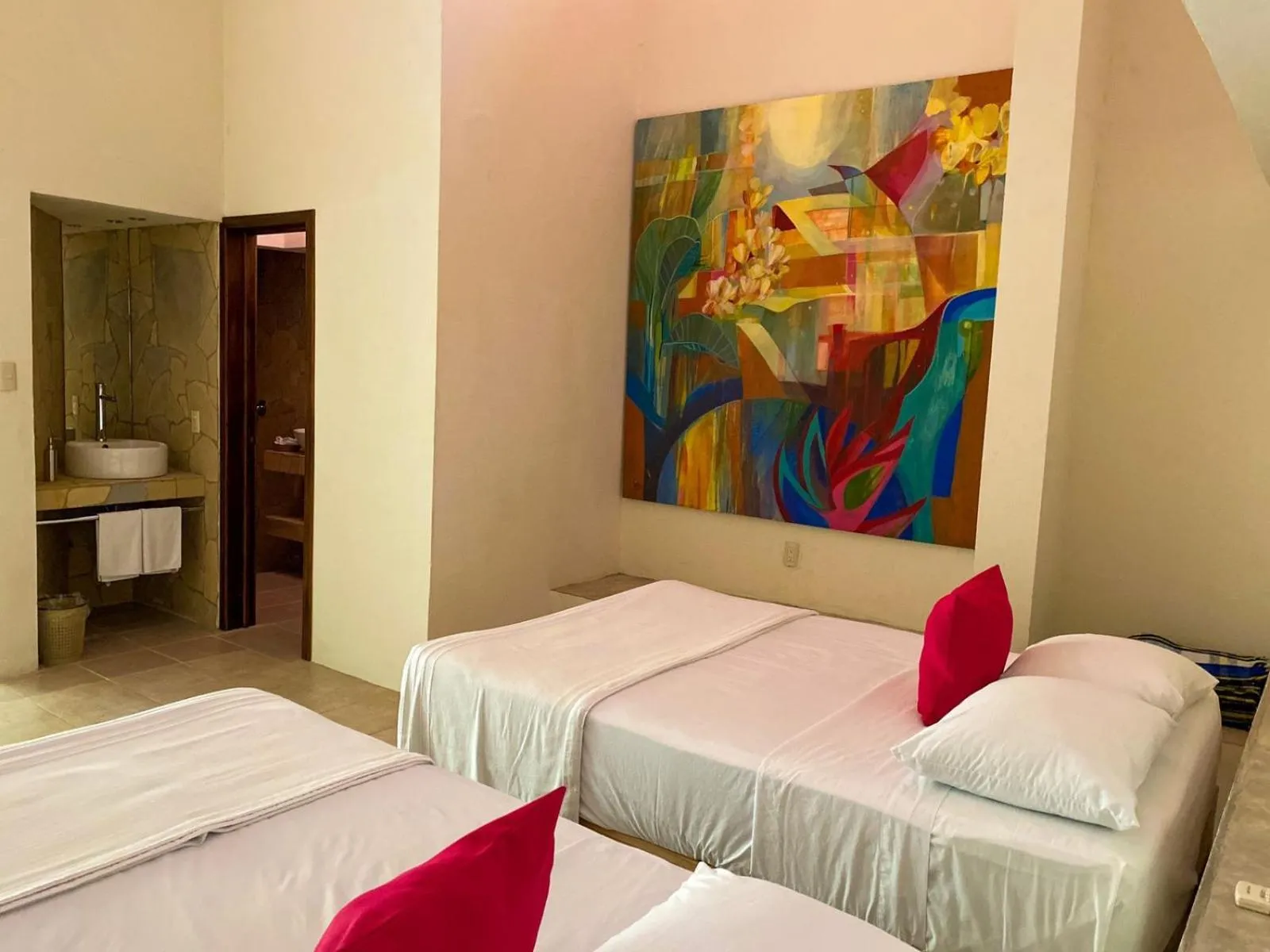 Bed in Hotel Maya Bell