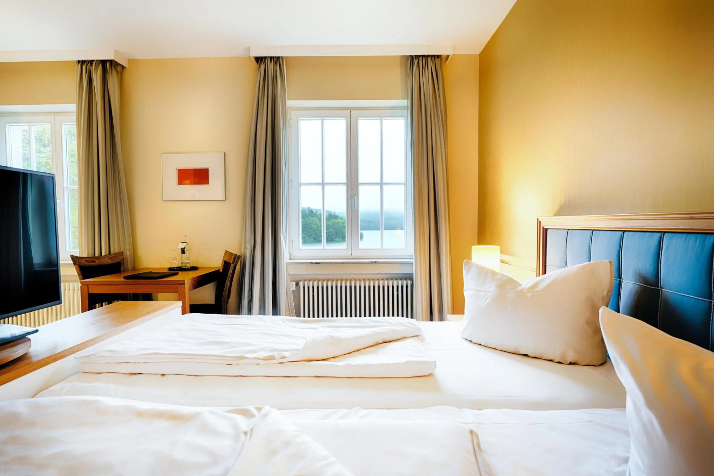 Photo of the whole room, Bed in Welcome Hotel Meschede Hennesee