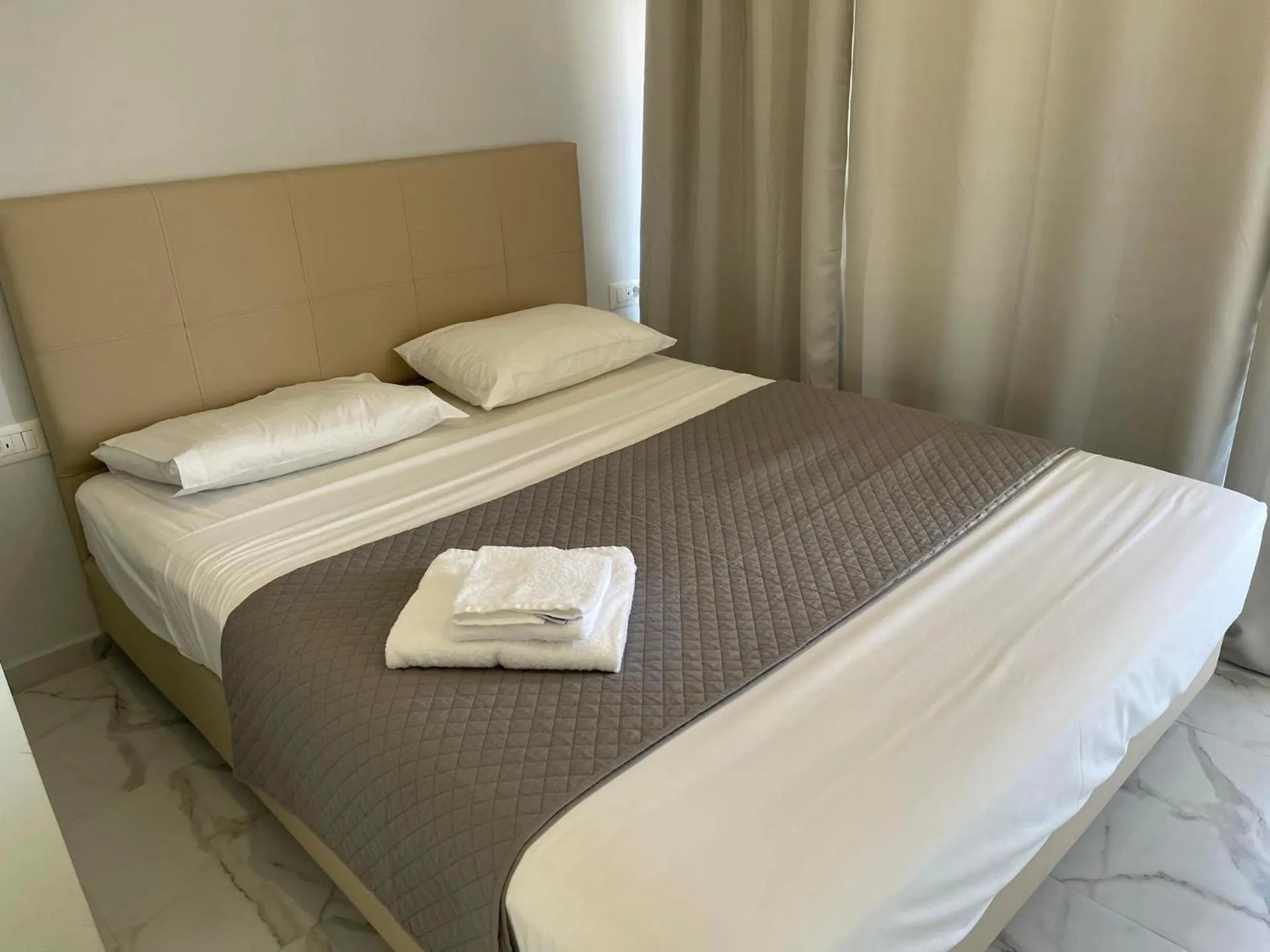 Bed in Pals Studios Pefkos