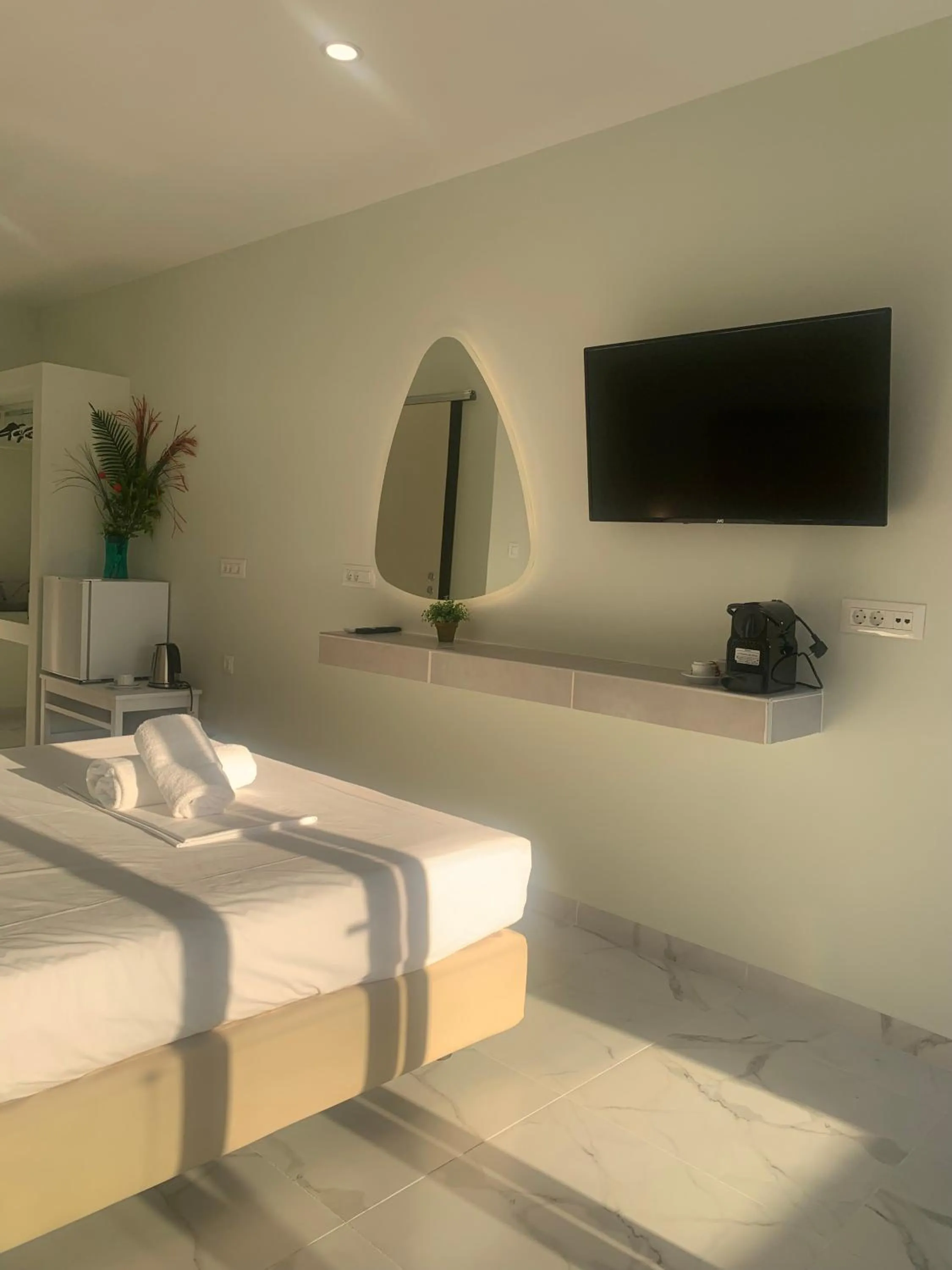 Bed in Pals Studios Pefkos