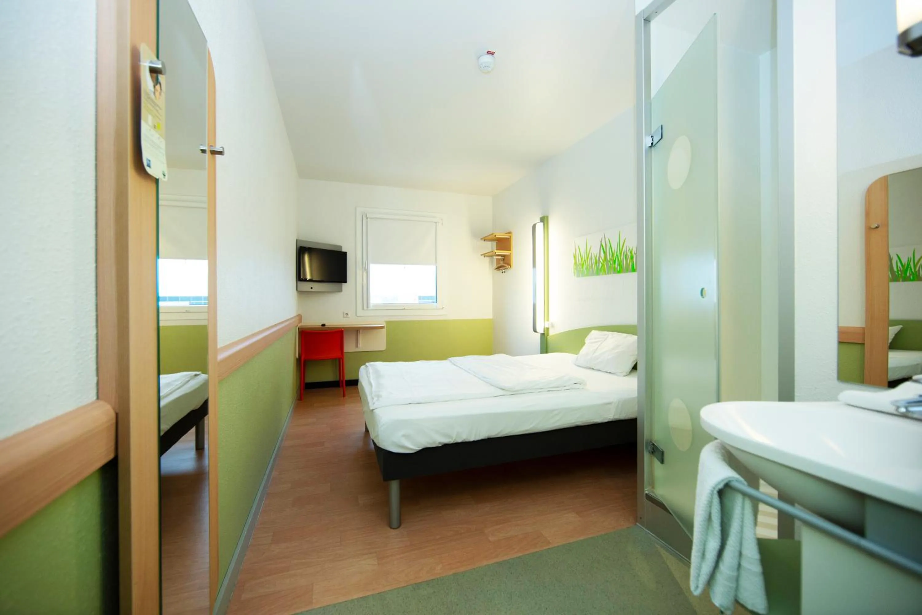 Photo of the whole room, Bed in ibis budget Flensburg Handewitt