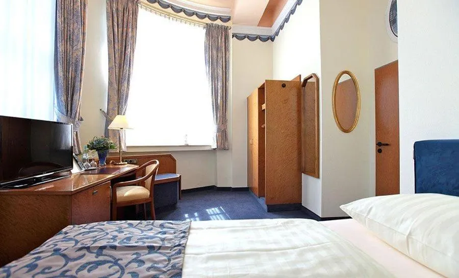Bed in Hotel Viktoria
