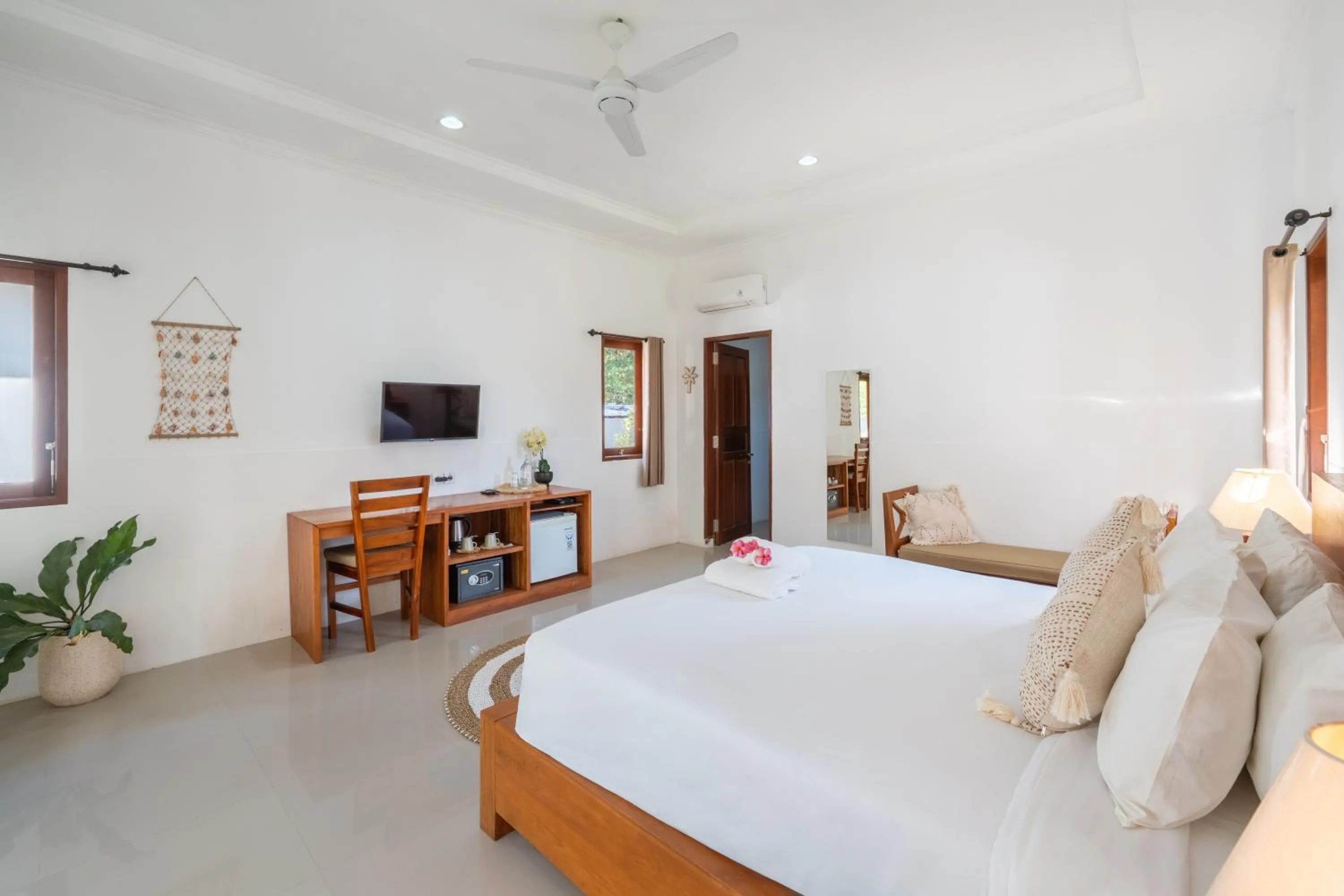 Bed in Nusa Indah Onai Hotel