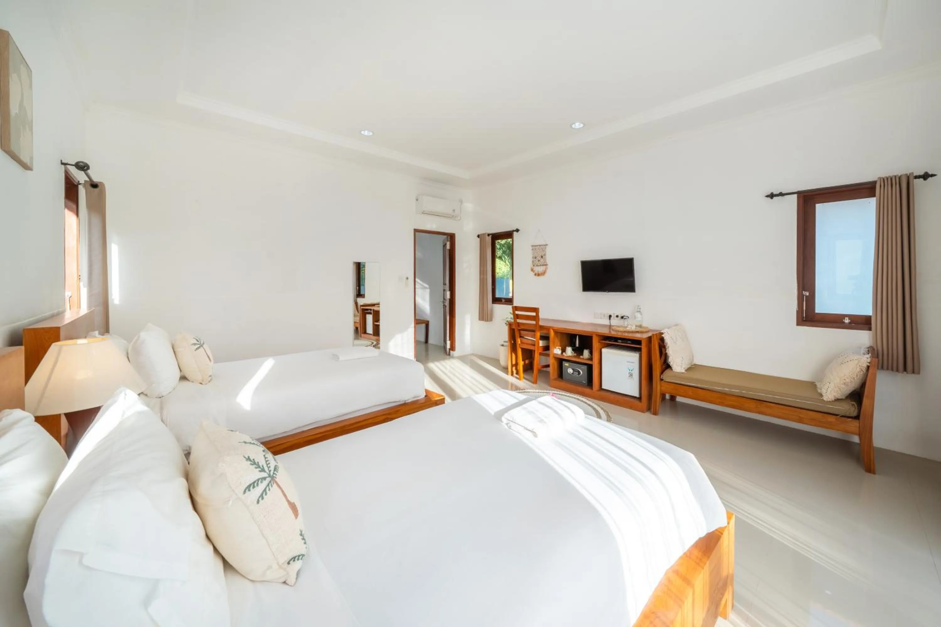 Bed in Nusa Indah Onai Hotel