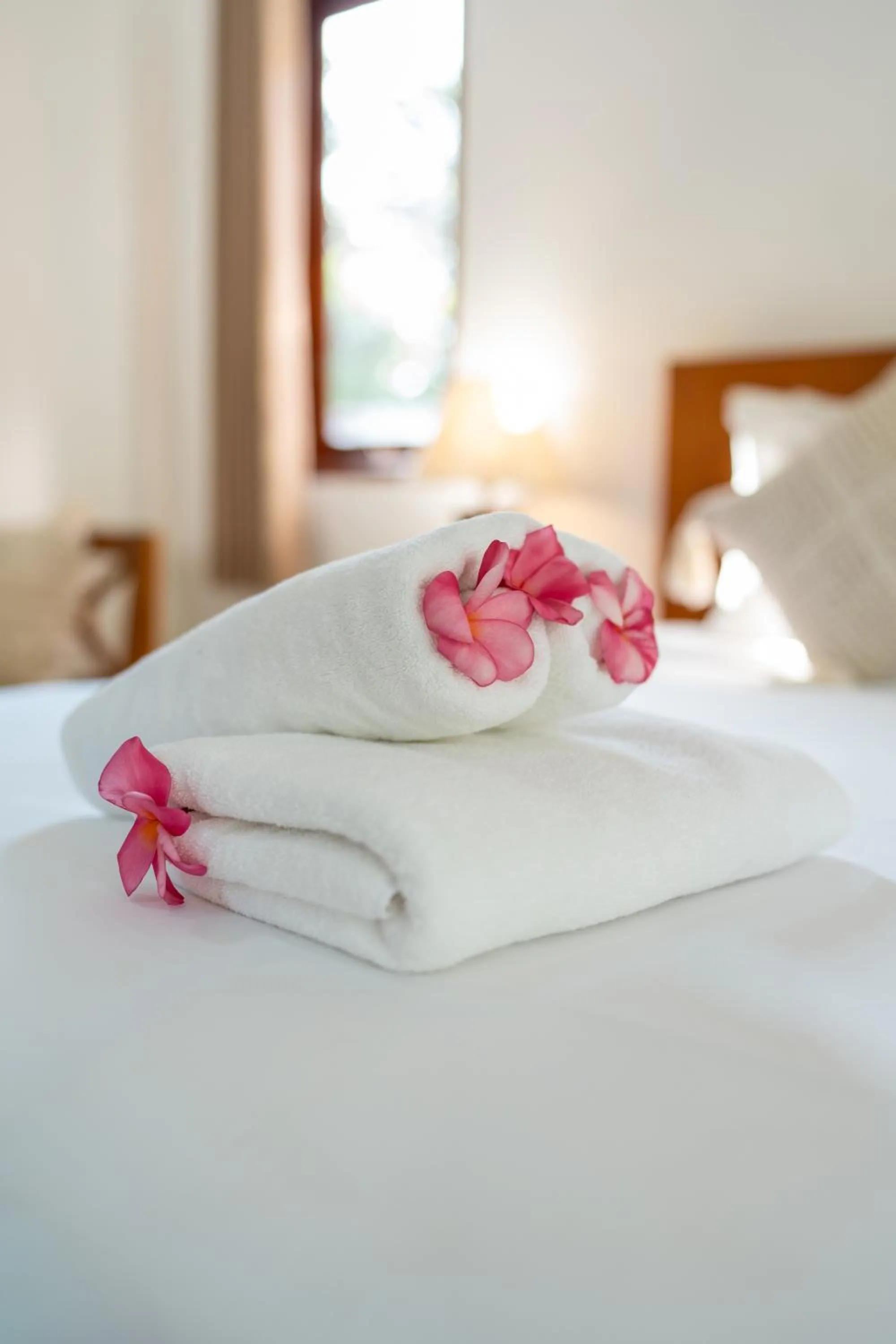 Bed in Nusa Indah Onai Hotel