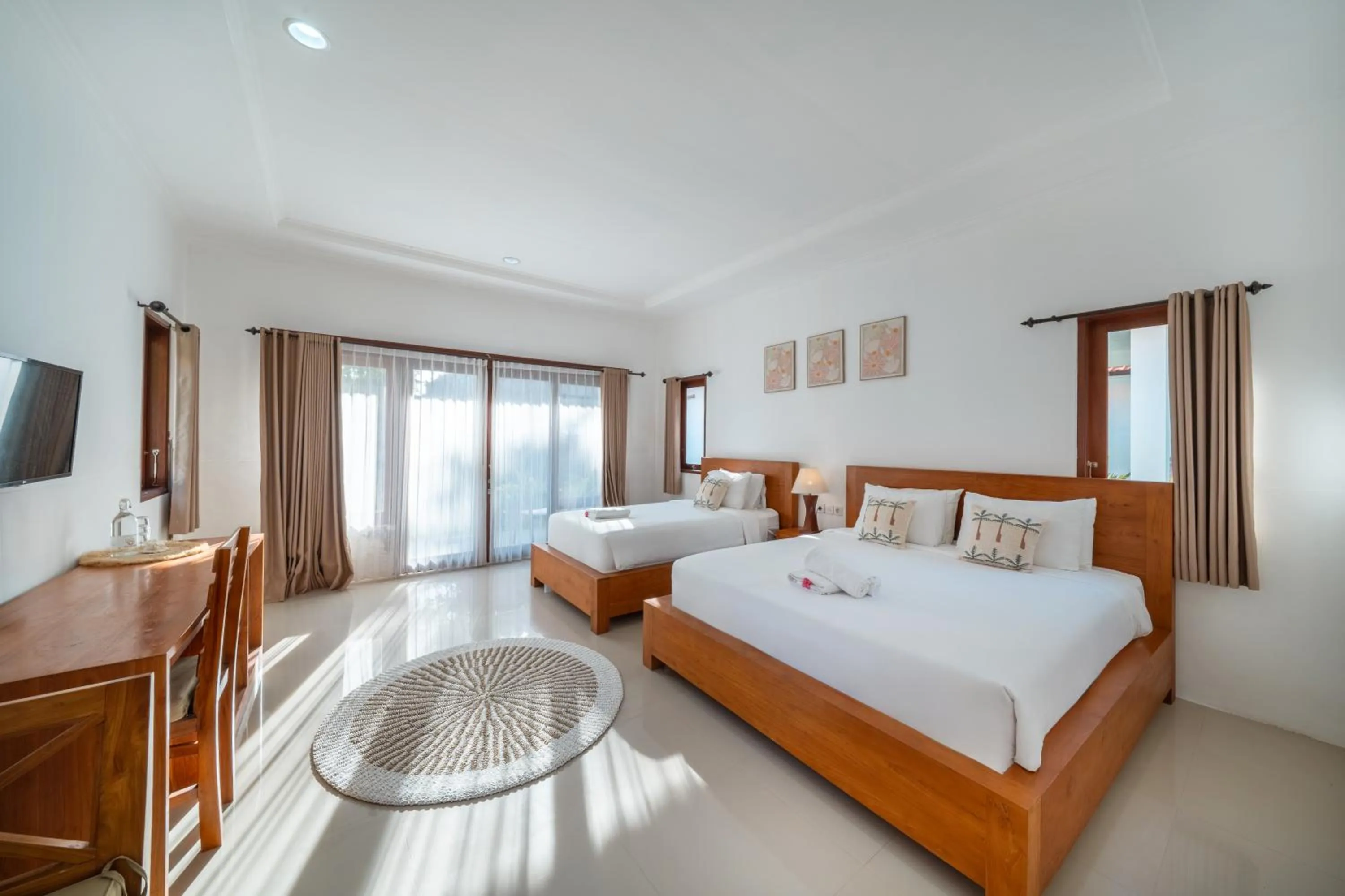 Bed in Nusa Indah Onai Hotel