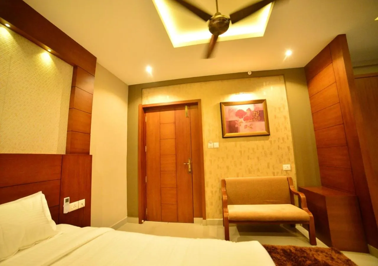 Seating area, Bed in Hotel Priya