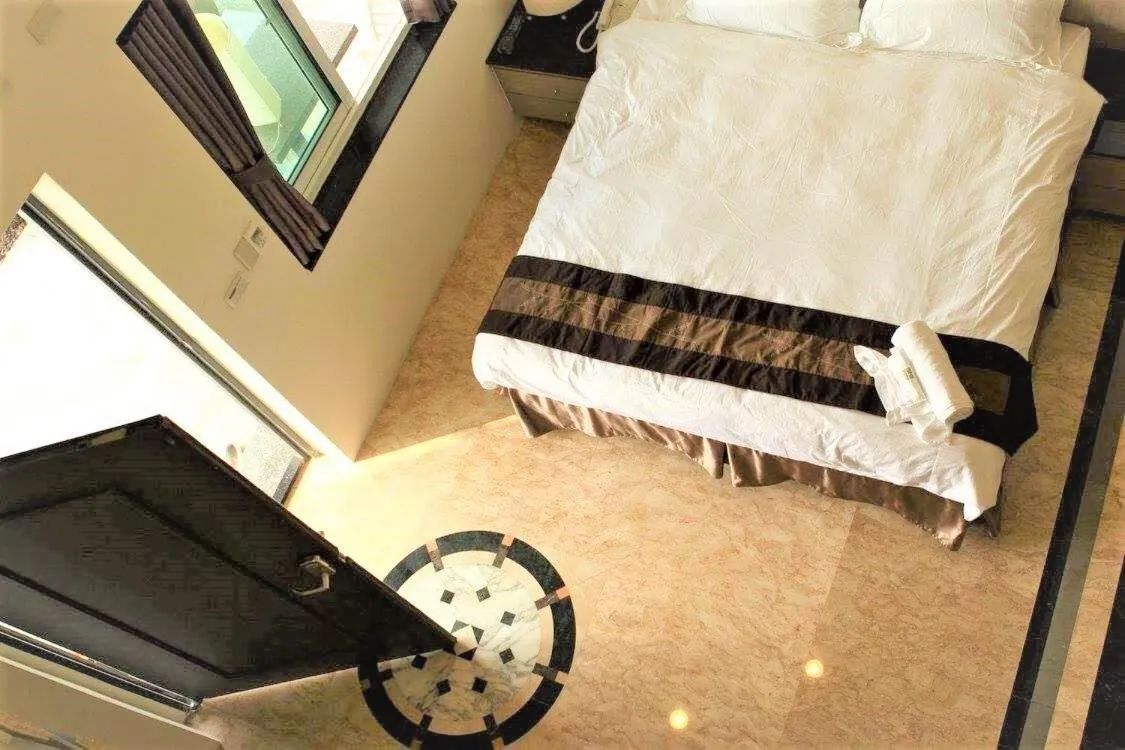 Bed in Palm Island B&B