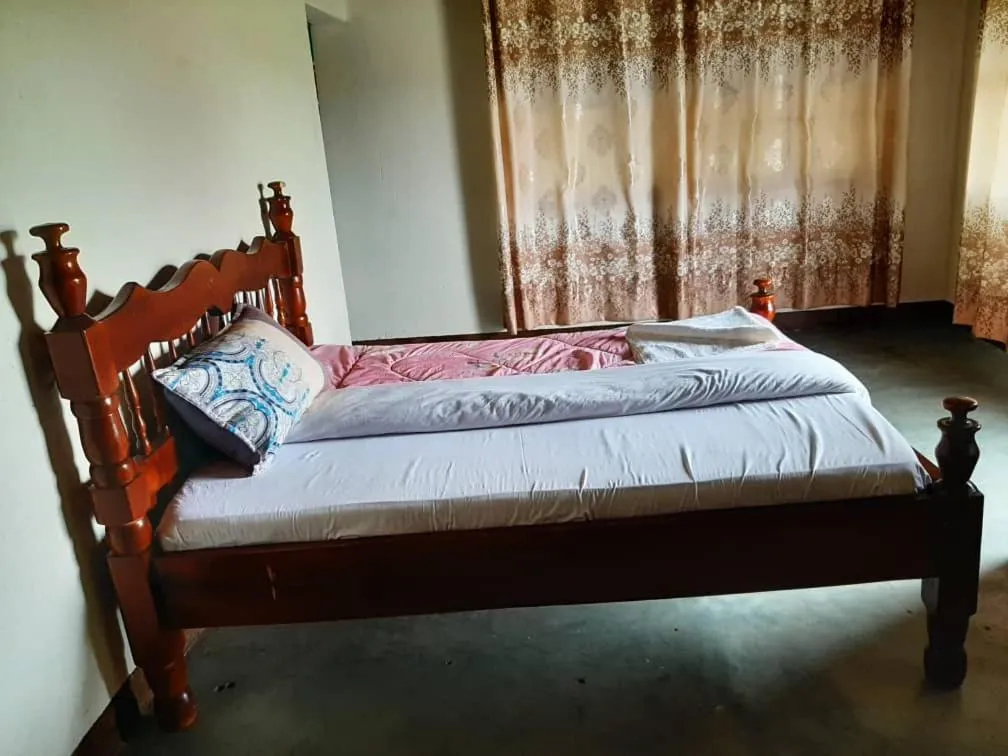 Photo of the whole room, Bed in Tangi Safari Lodge