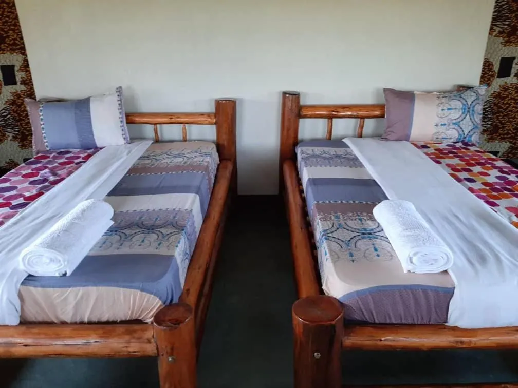 Bedroom, Bed in Tangi Safari Lodge