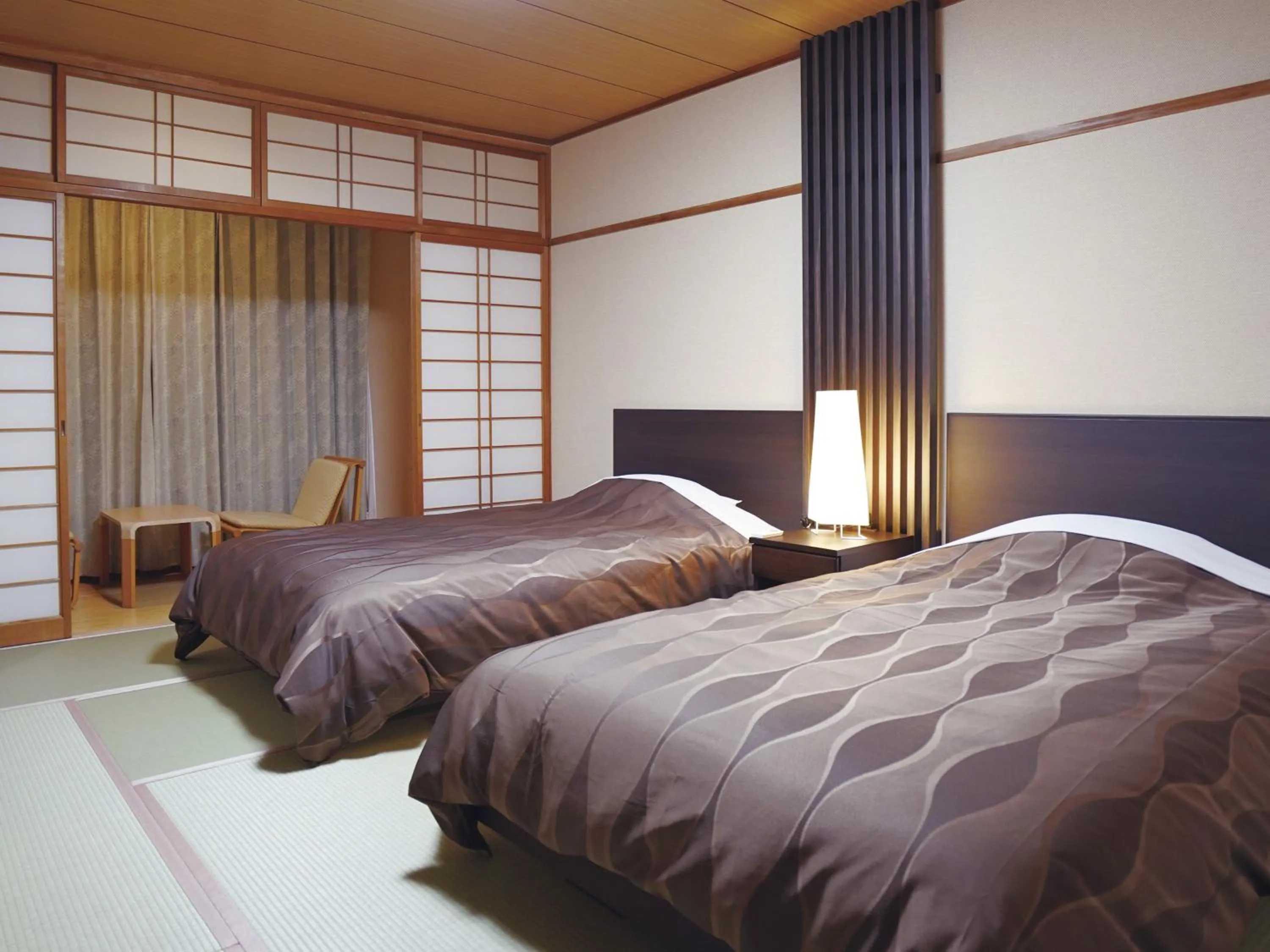 Photo of the whole room, Bed in The Gran Resort Kinosaki