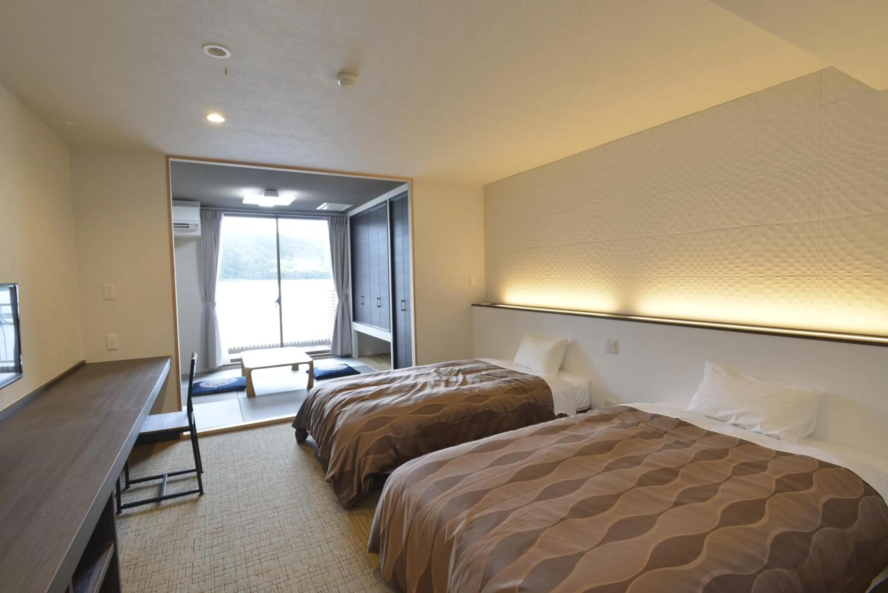 Bed in The Gran Resort Mikatagoko