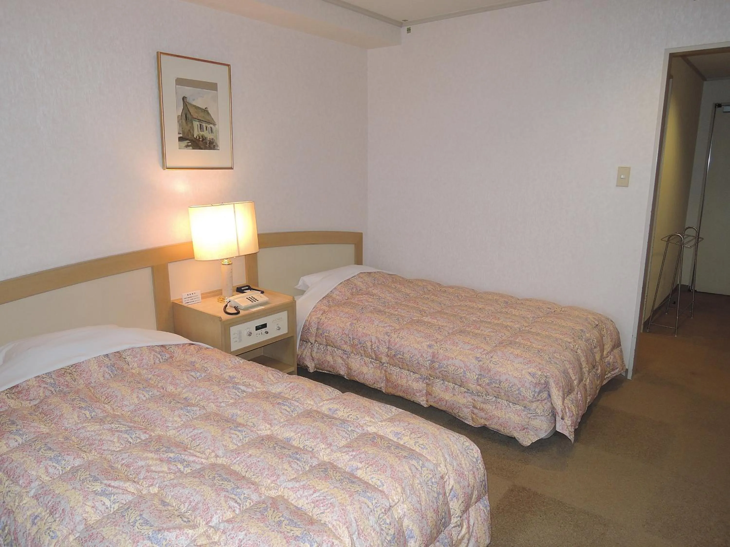 Bed in The Gran Resort Arima