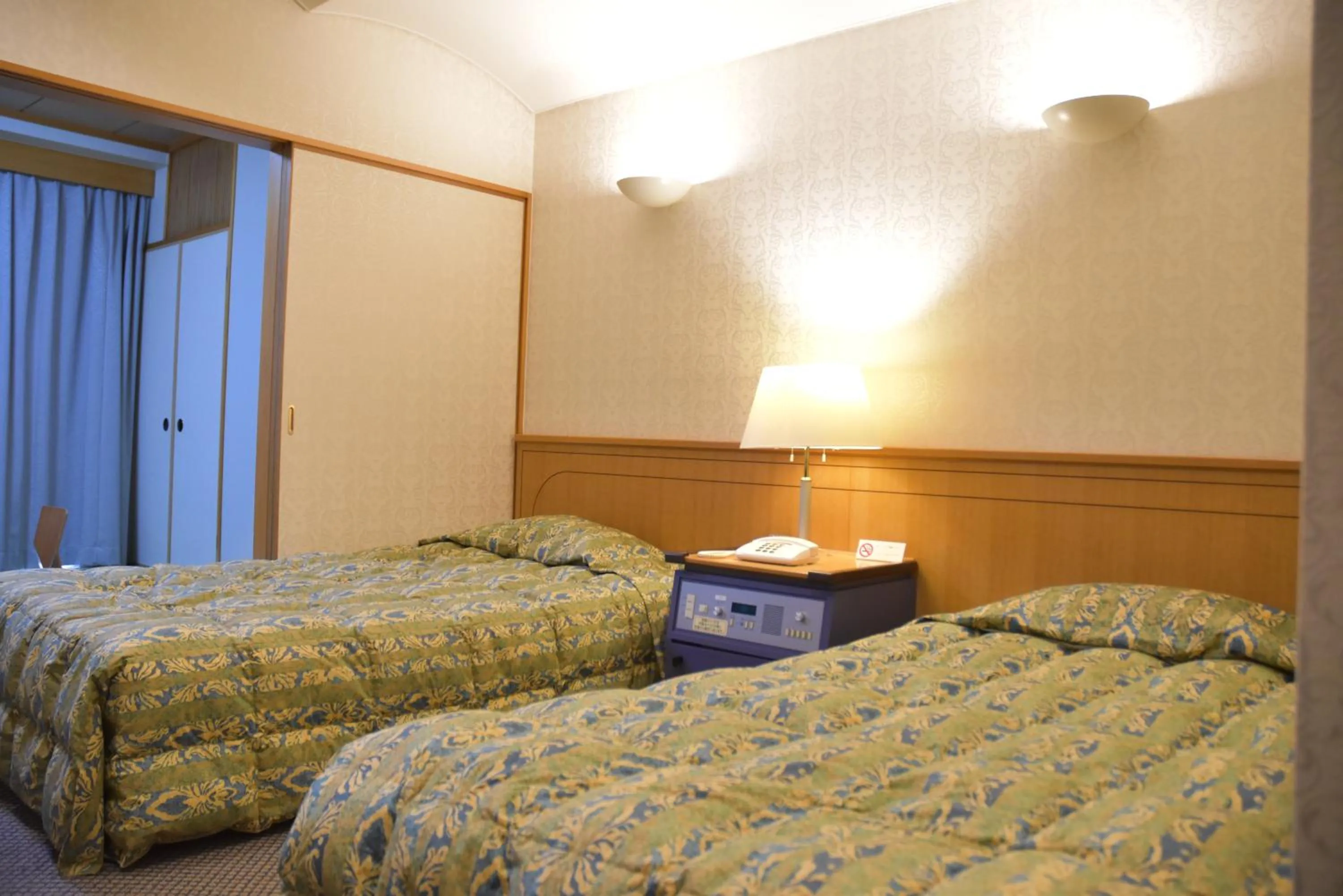 Bed in The Gran Resort Elegante Awajishima