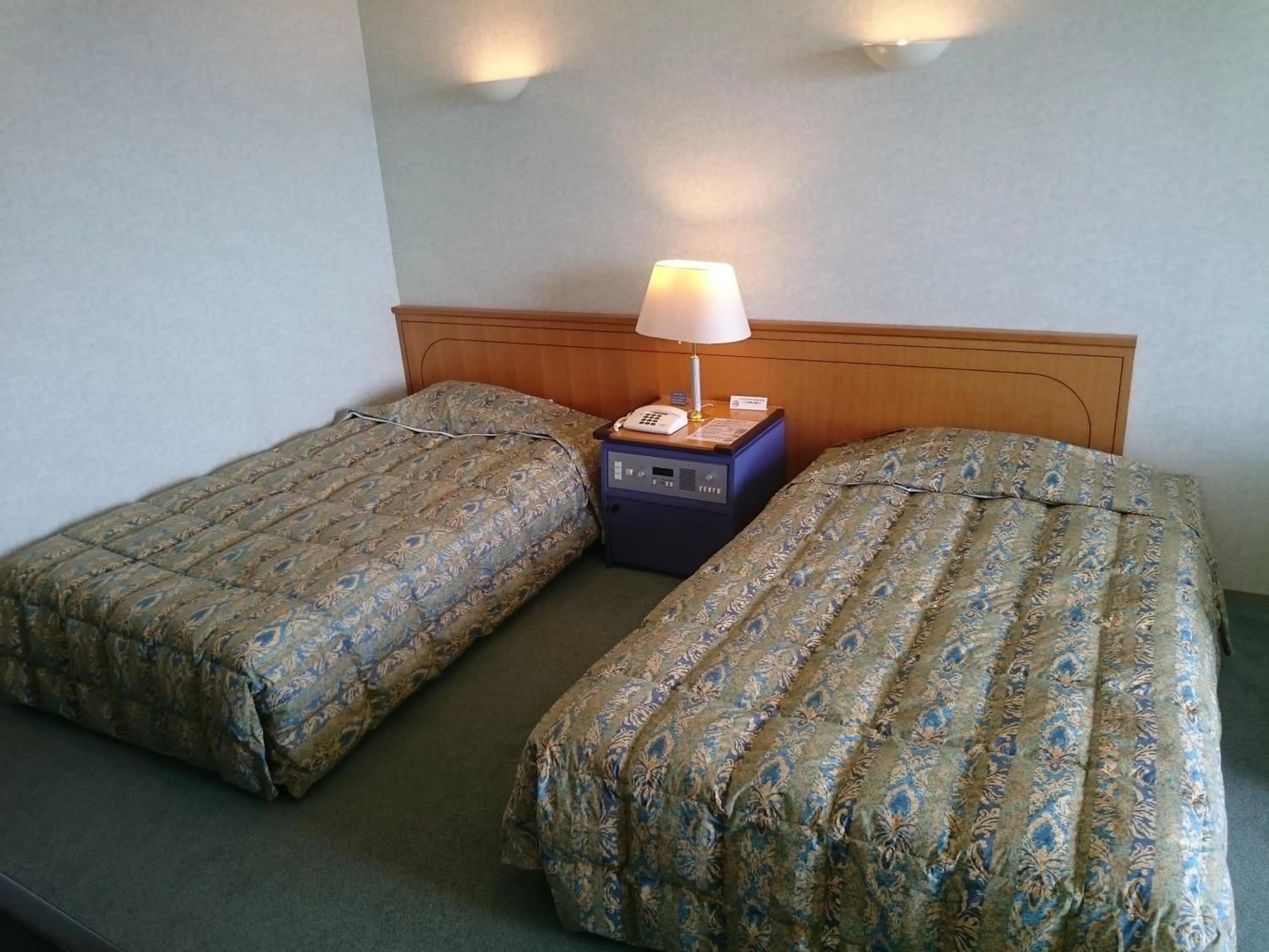 Bed in The Gran Resort Elegante Awajishima