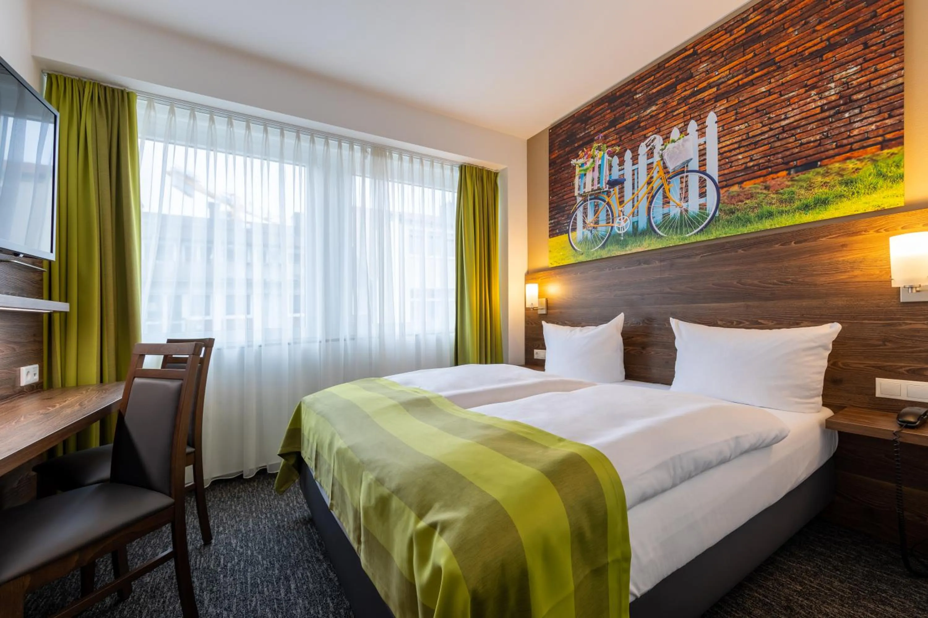 Photo of the whole room, Bed in Trip Inn Hotel Münster City