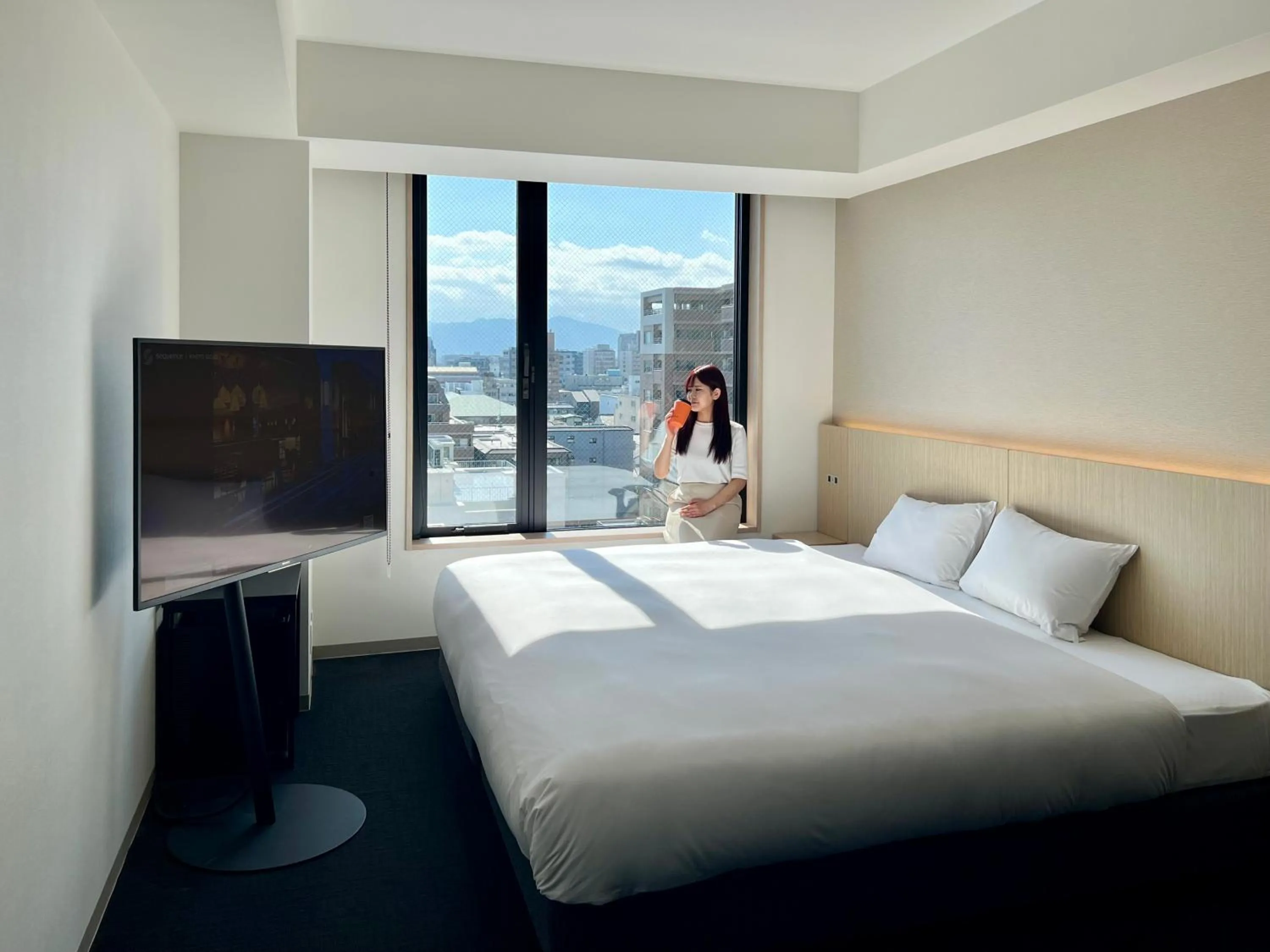 Photo of the whole room, Bed in sequence KYOTO GOJO