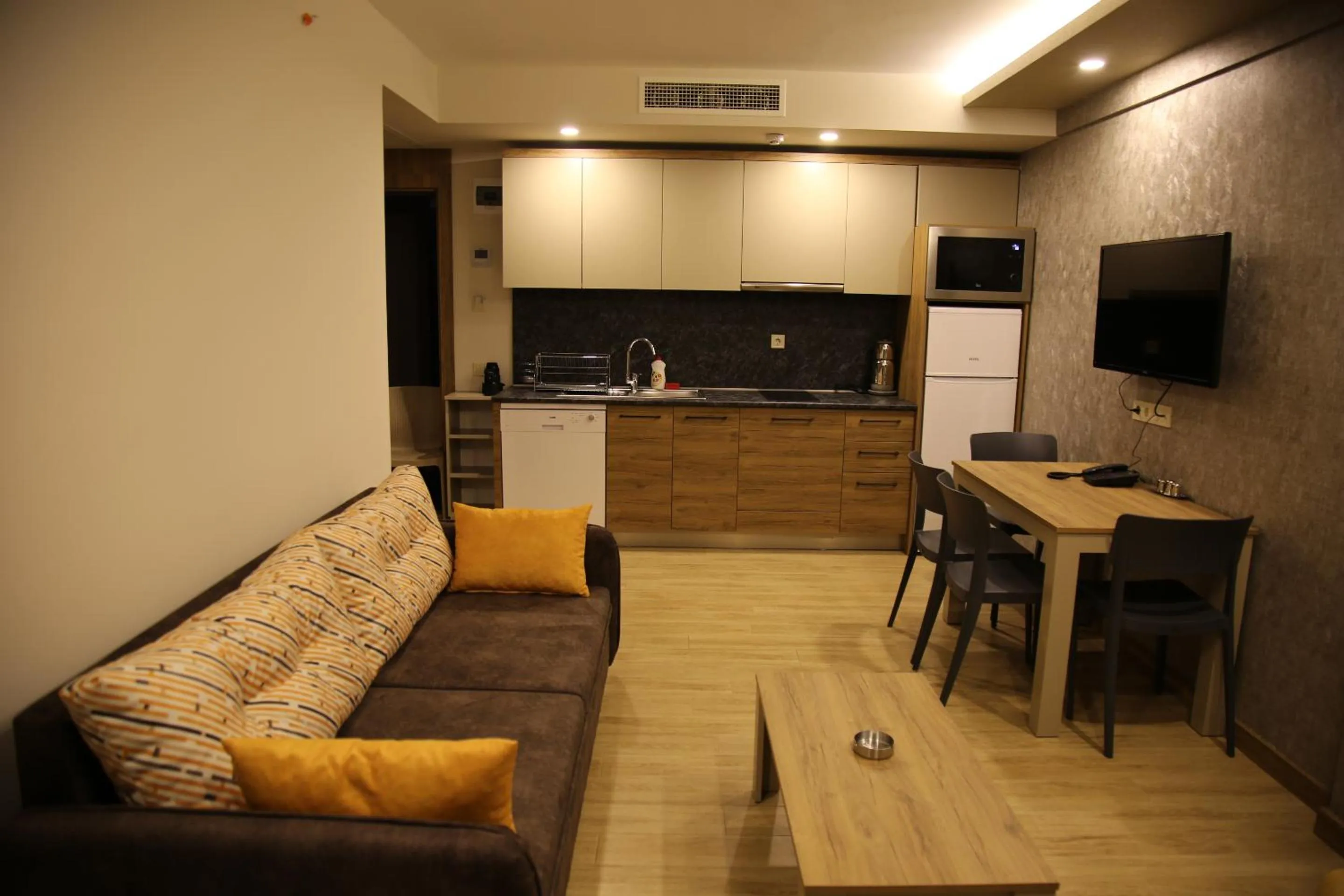 Kitchen or kitchenette in Golden World Suite Hotel