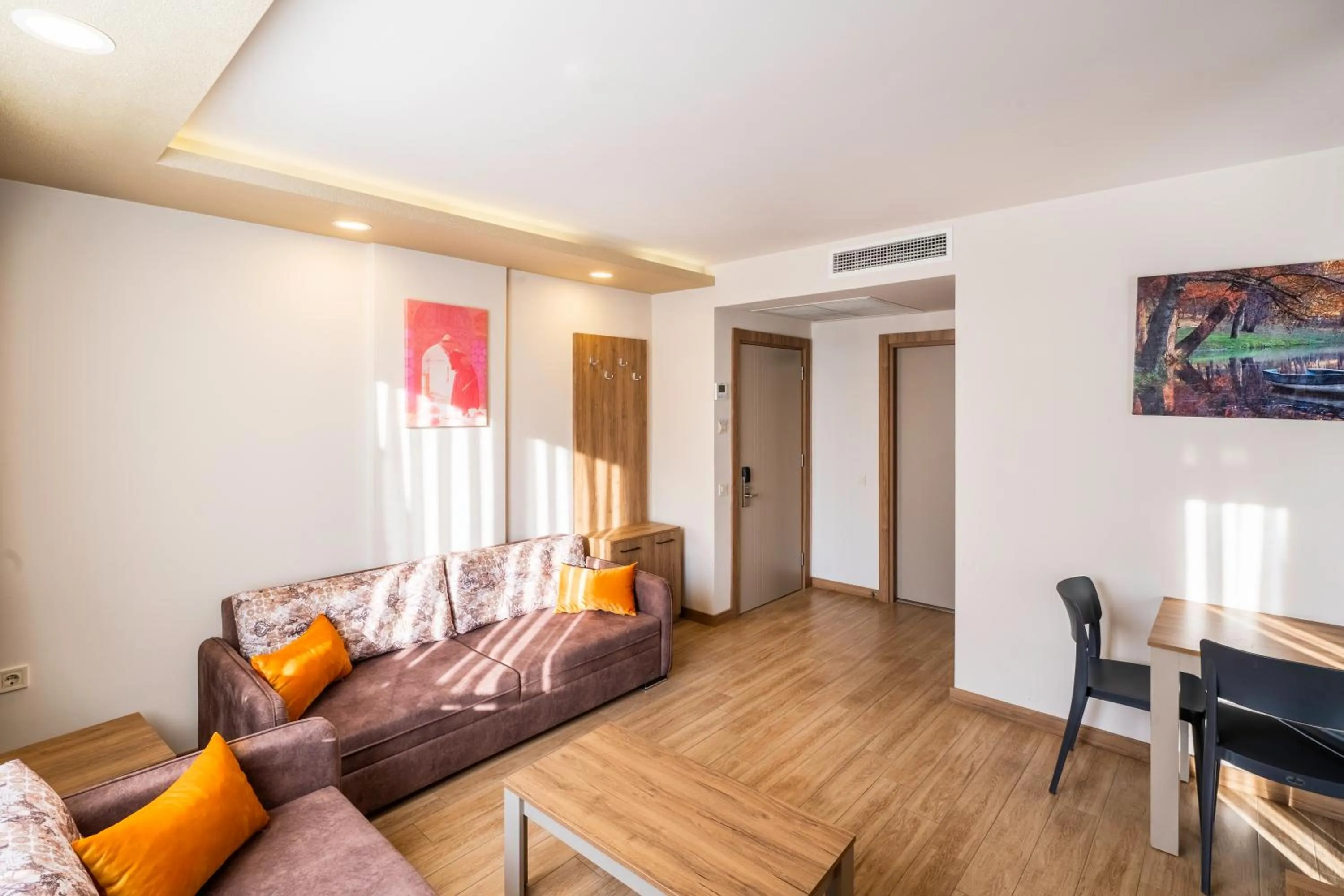 Living room in Golden World Suite Hotel