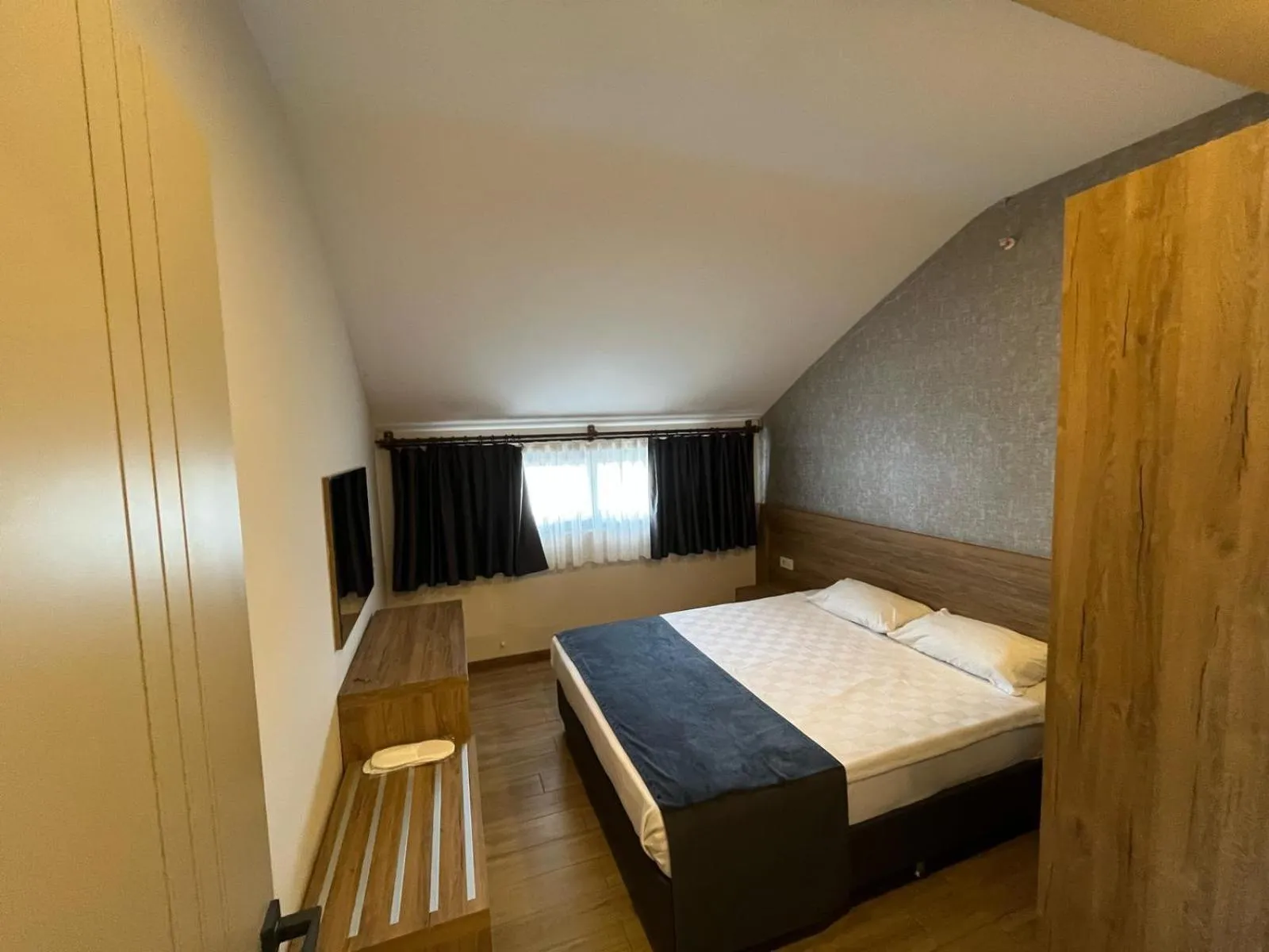 Bed in Golden World Suite Hotel