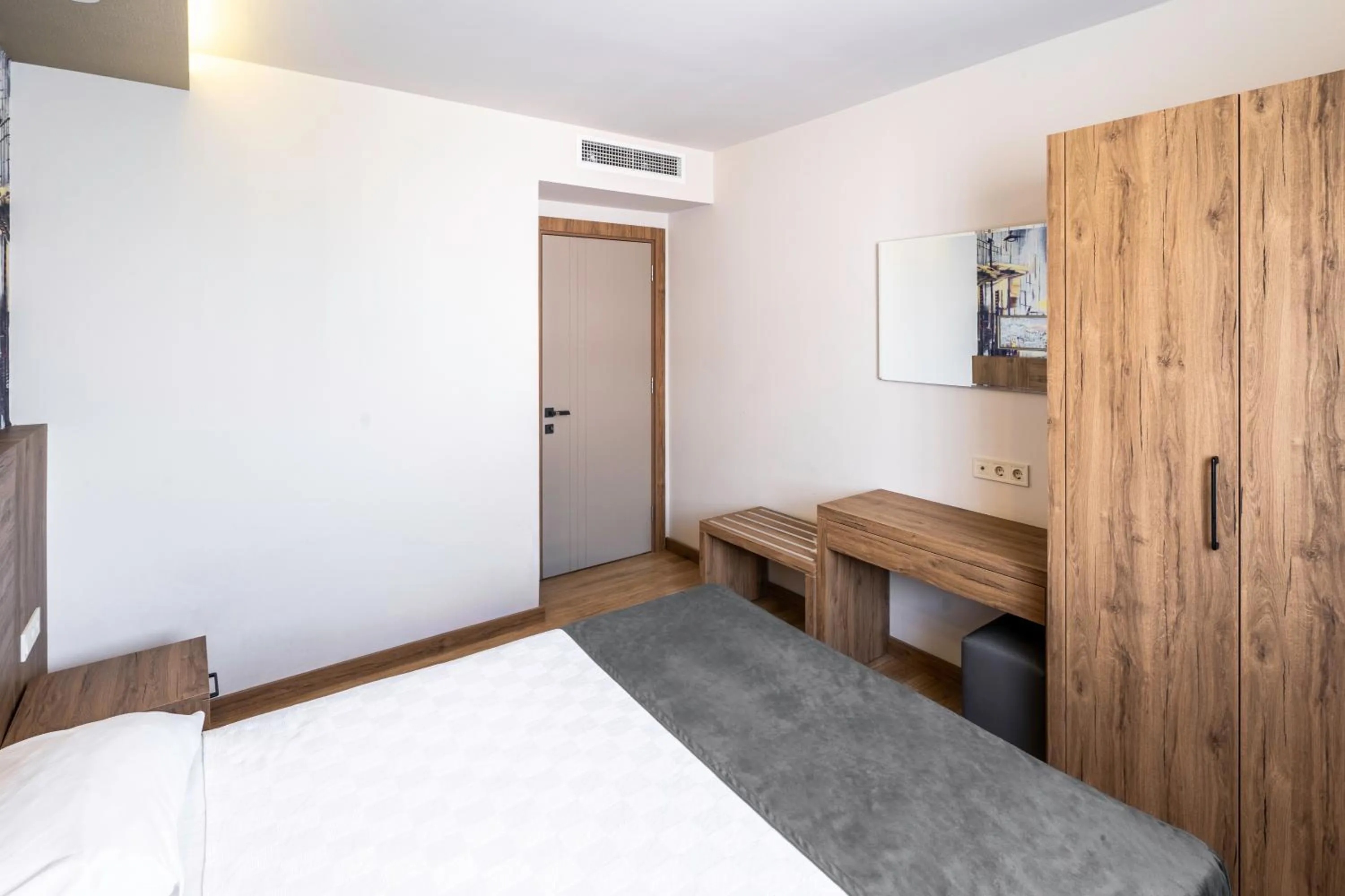 Bed in Golden World Suite Hotel