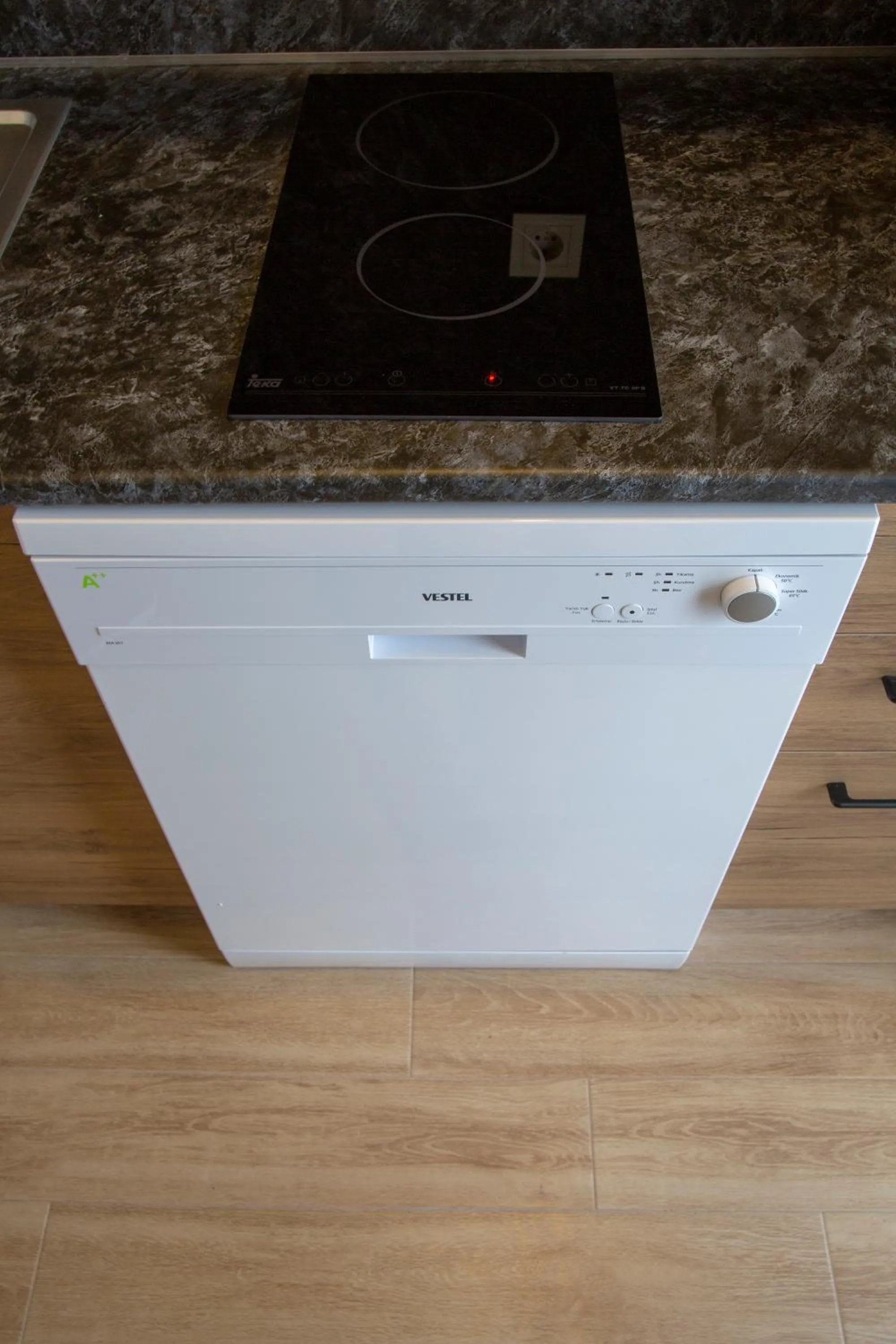 Communal kitchen in Golden World Suite Hotel