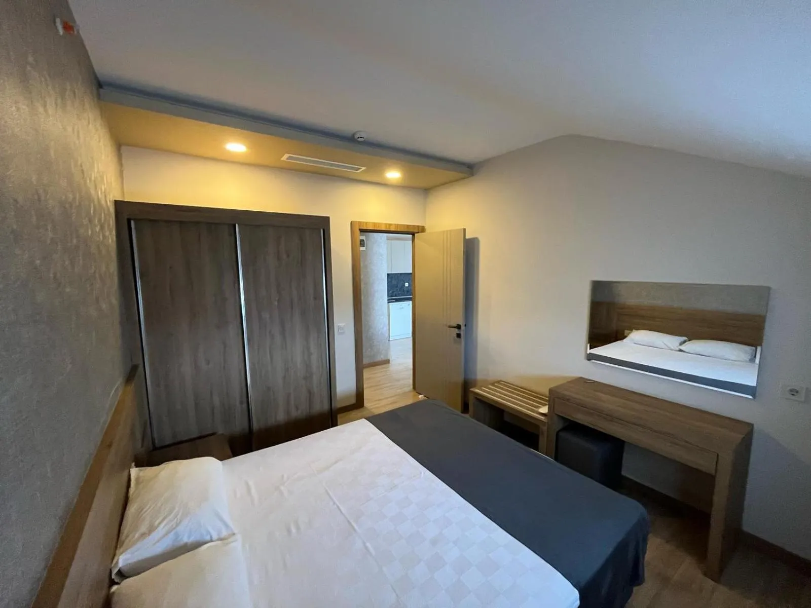 Bed in Golden World Suite Hotel