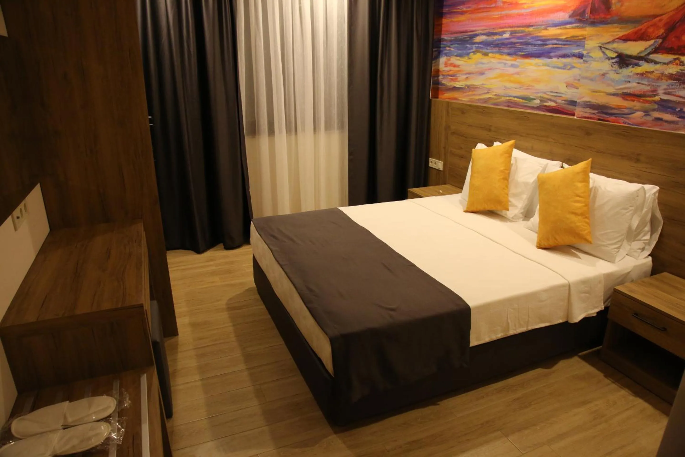 Bedroom, Bed in Golden World Suite Hotel