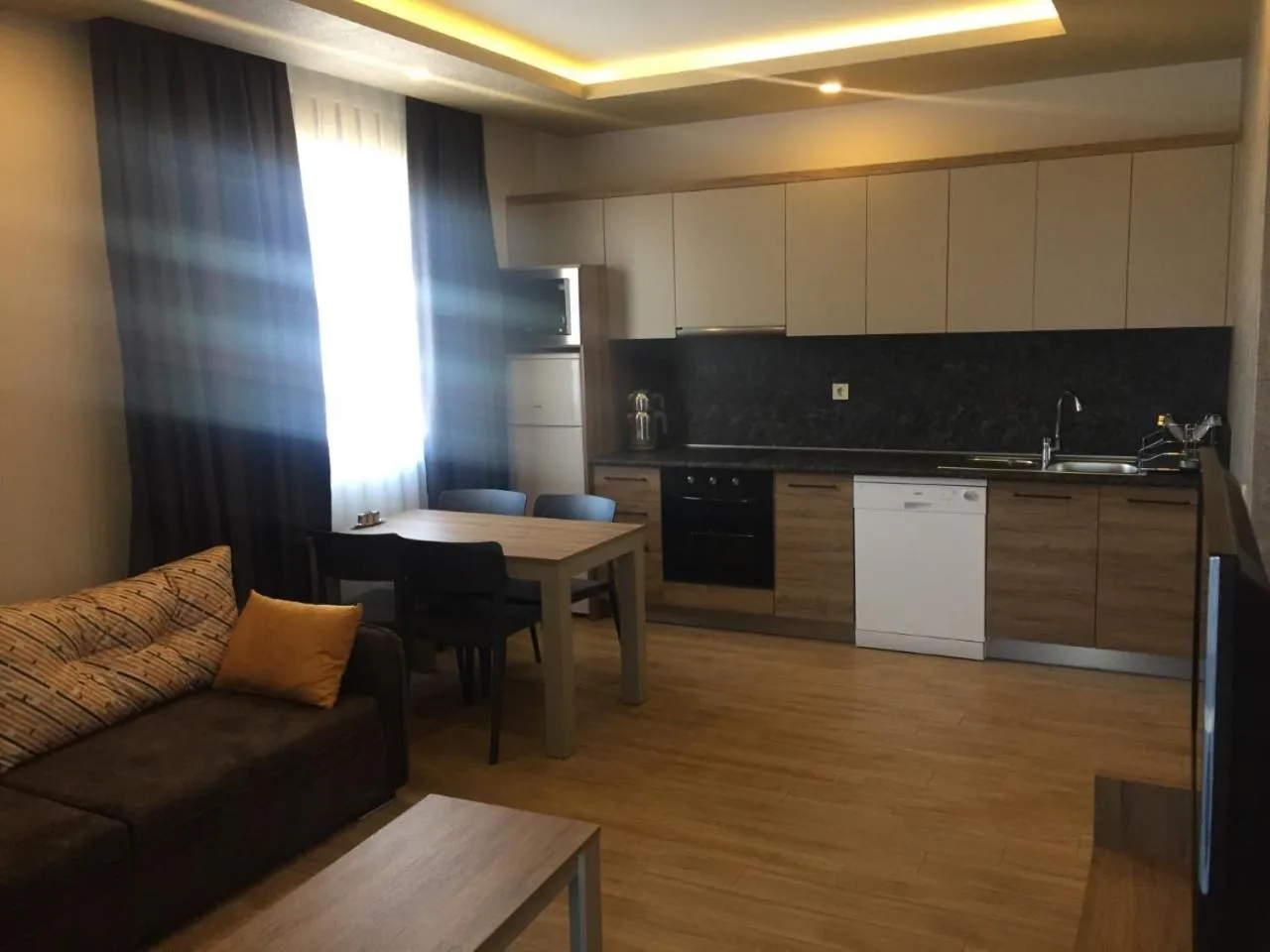Kitchen or kitchenette in Golden World Suite Hotel