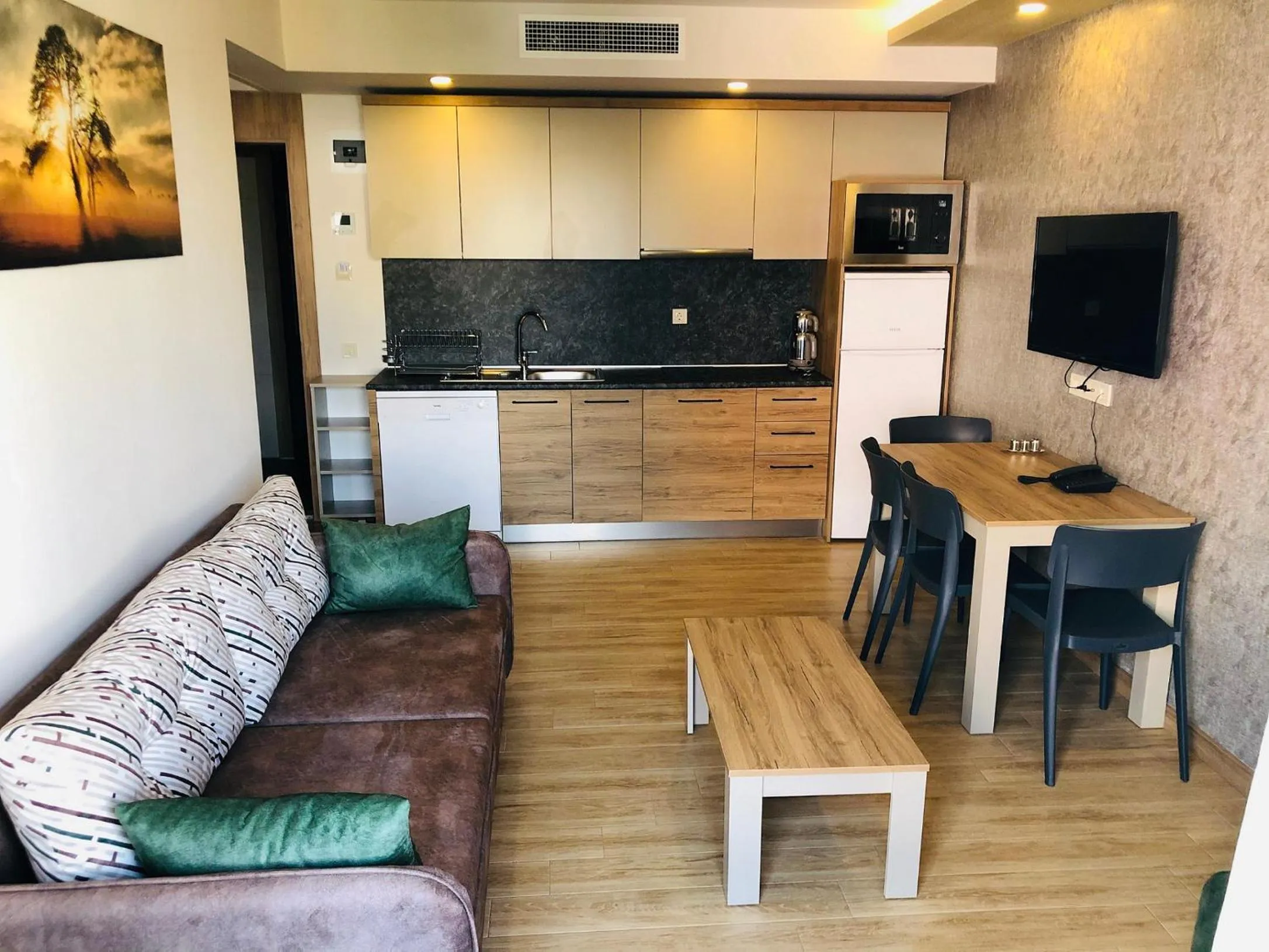 Kitchen or kitchenette in Golden World Suite Hotel