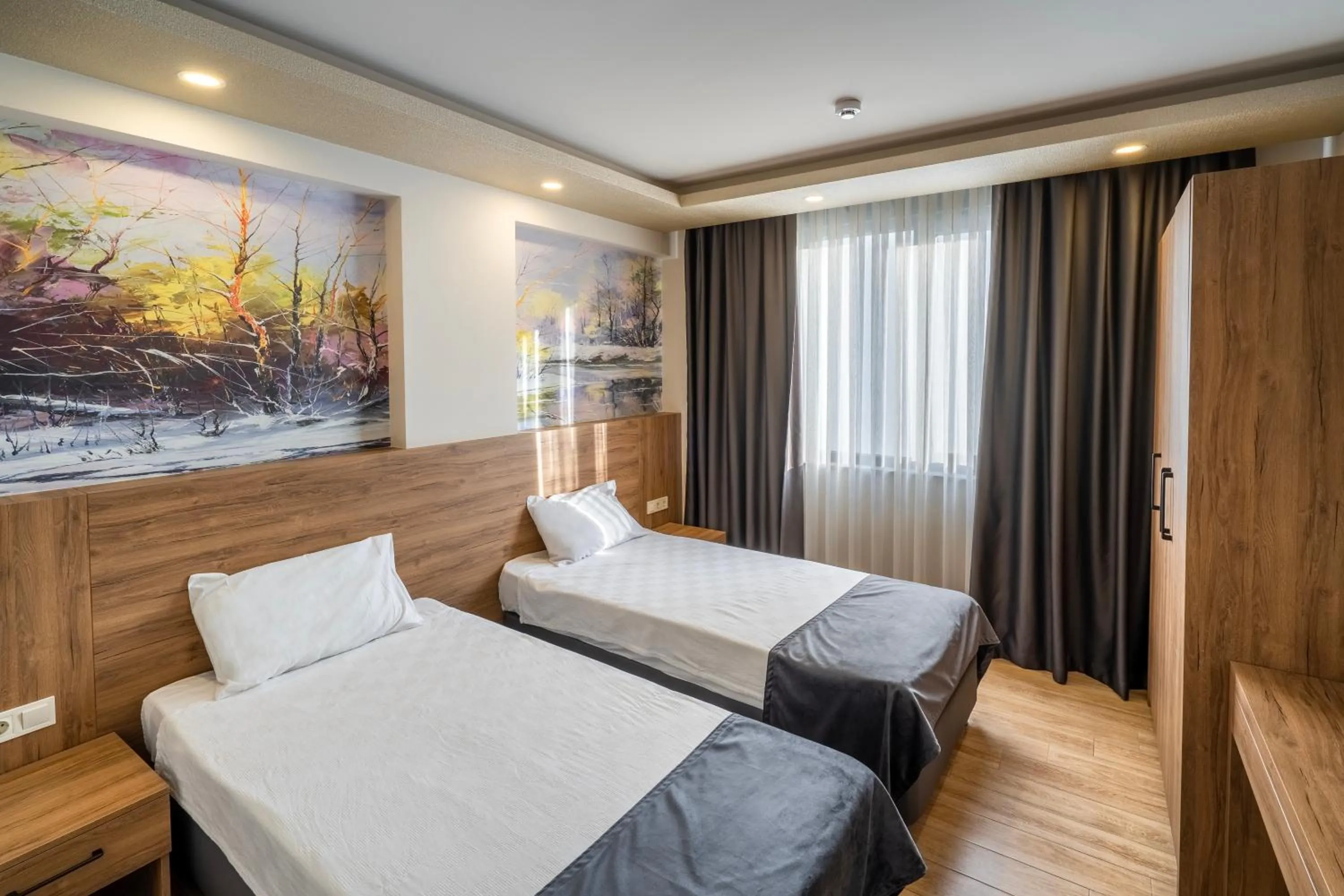 Bed in Golden World Suite Hotel