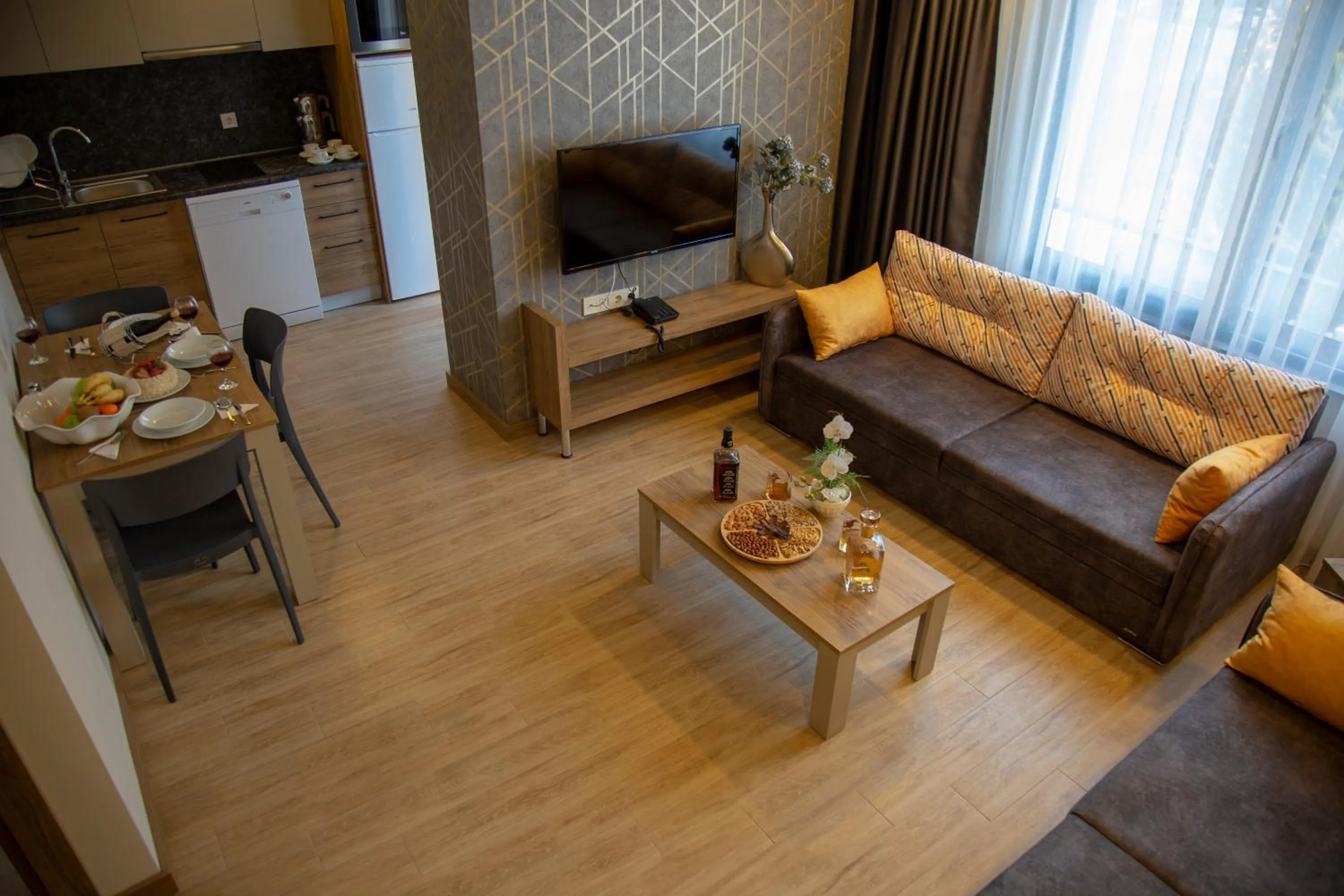 Living room in Golden World Suite Hotel