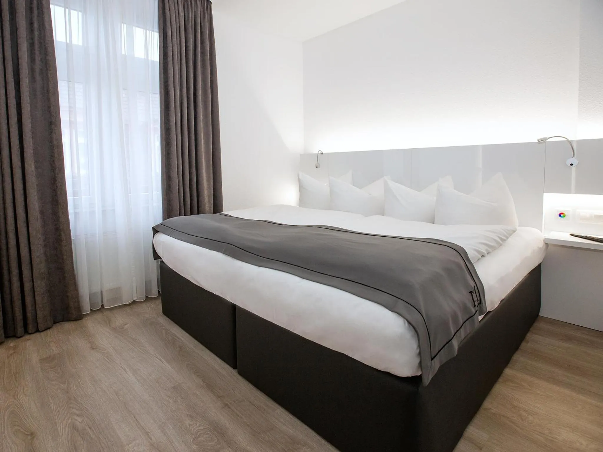 Photo of the whole room, Bed in DORMERO Hotel Worms