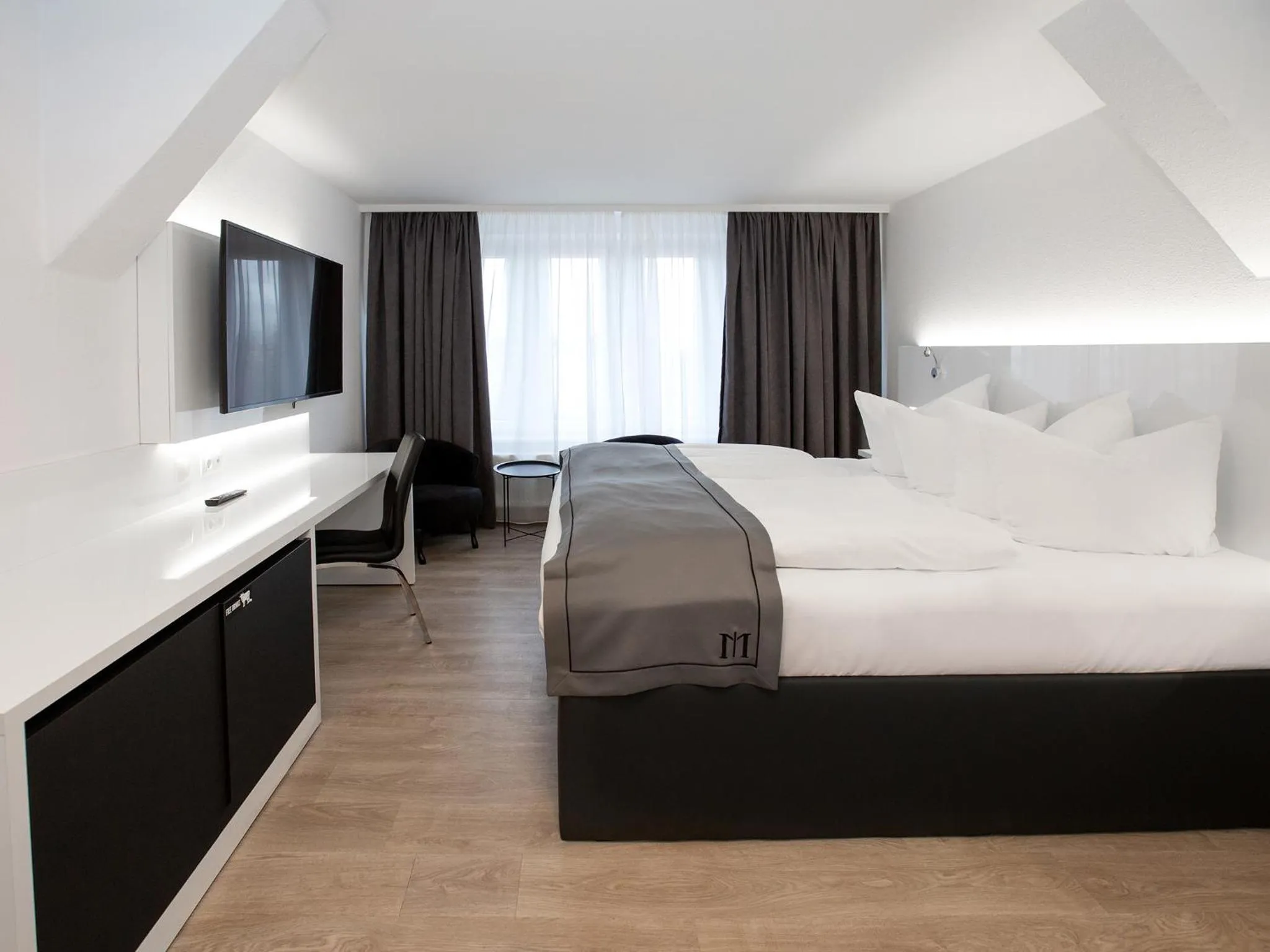 Photo of the whole room, Bed in DORMERO Hotel Worms